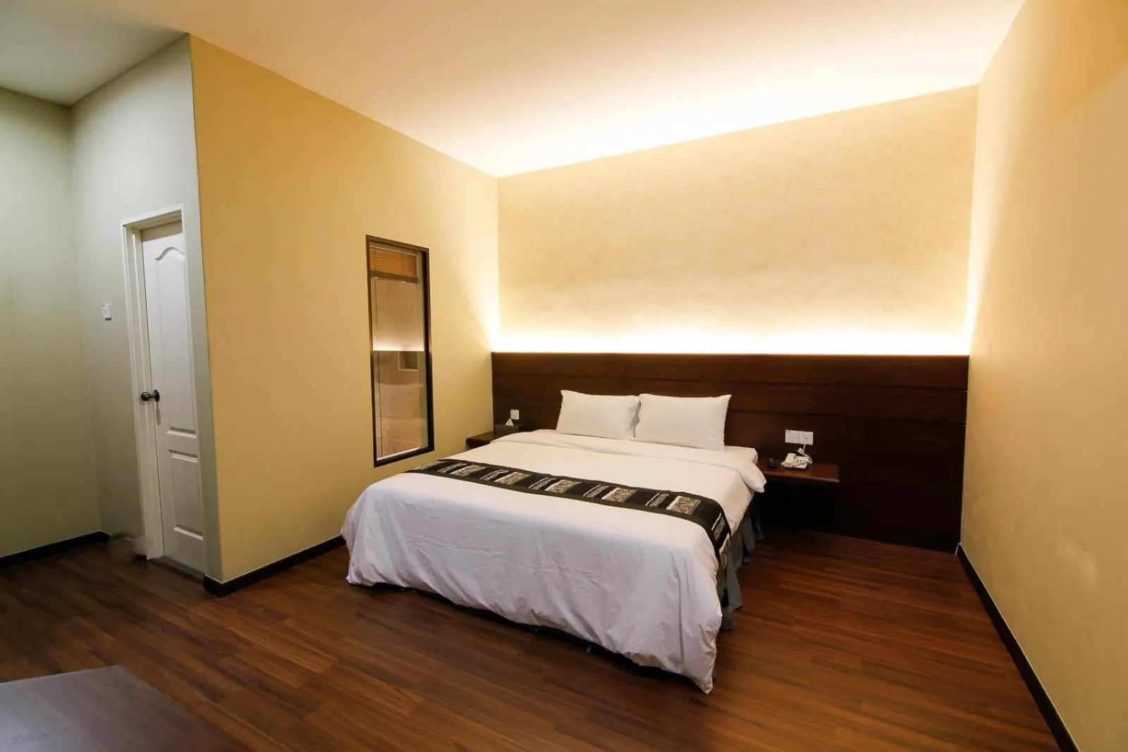 Bed in Art Cottage Hotel