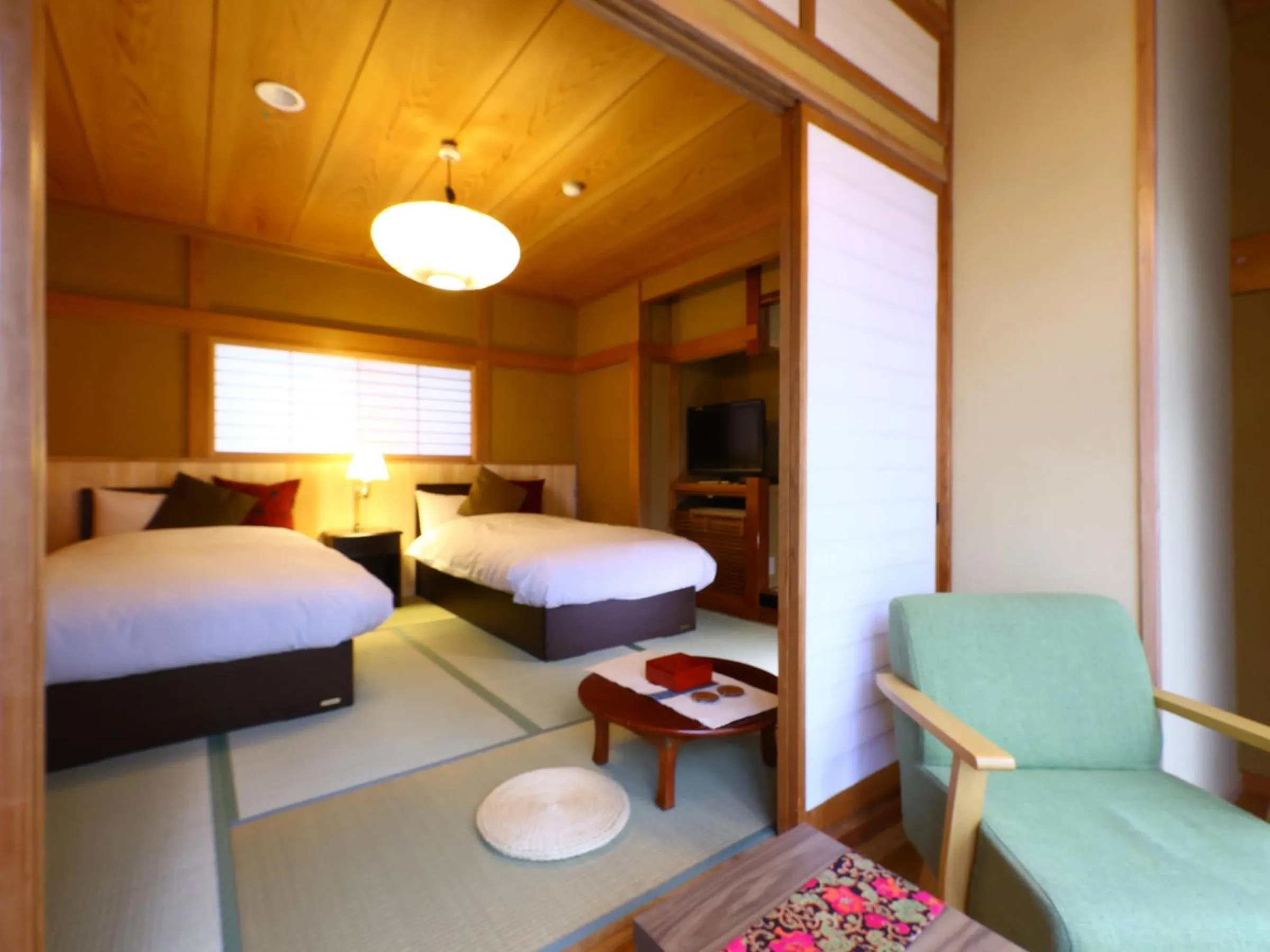 Photo of the whole room, Bed in Kamei no Yu