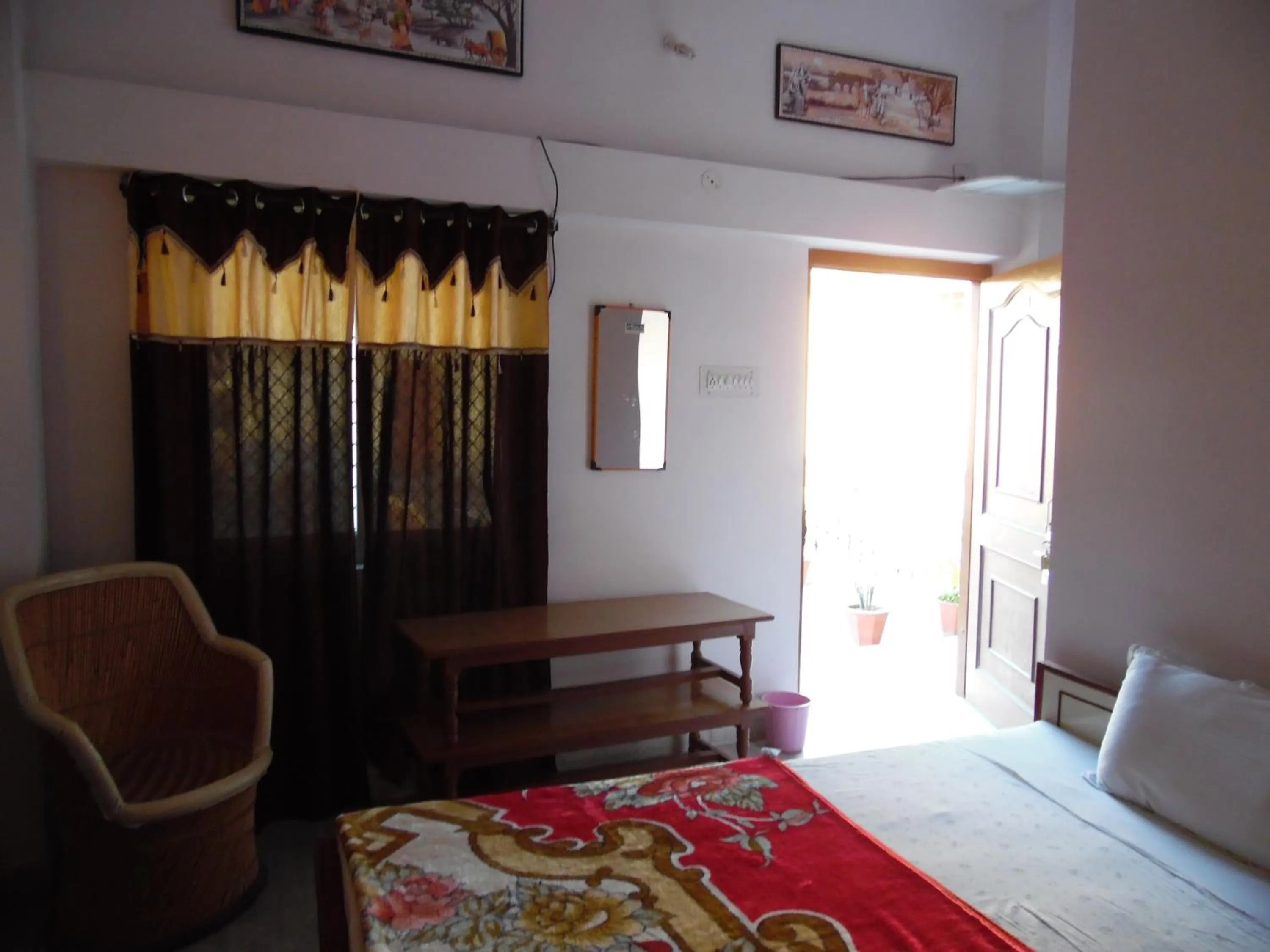 Living room, Bed in Keshav Palace -A Family Homestay