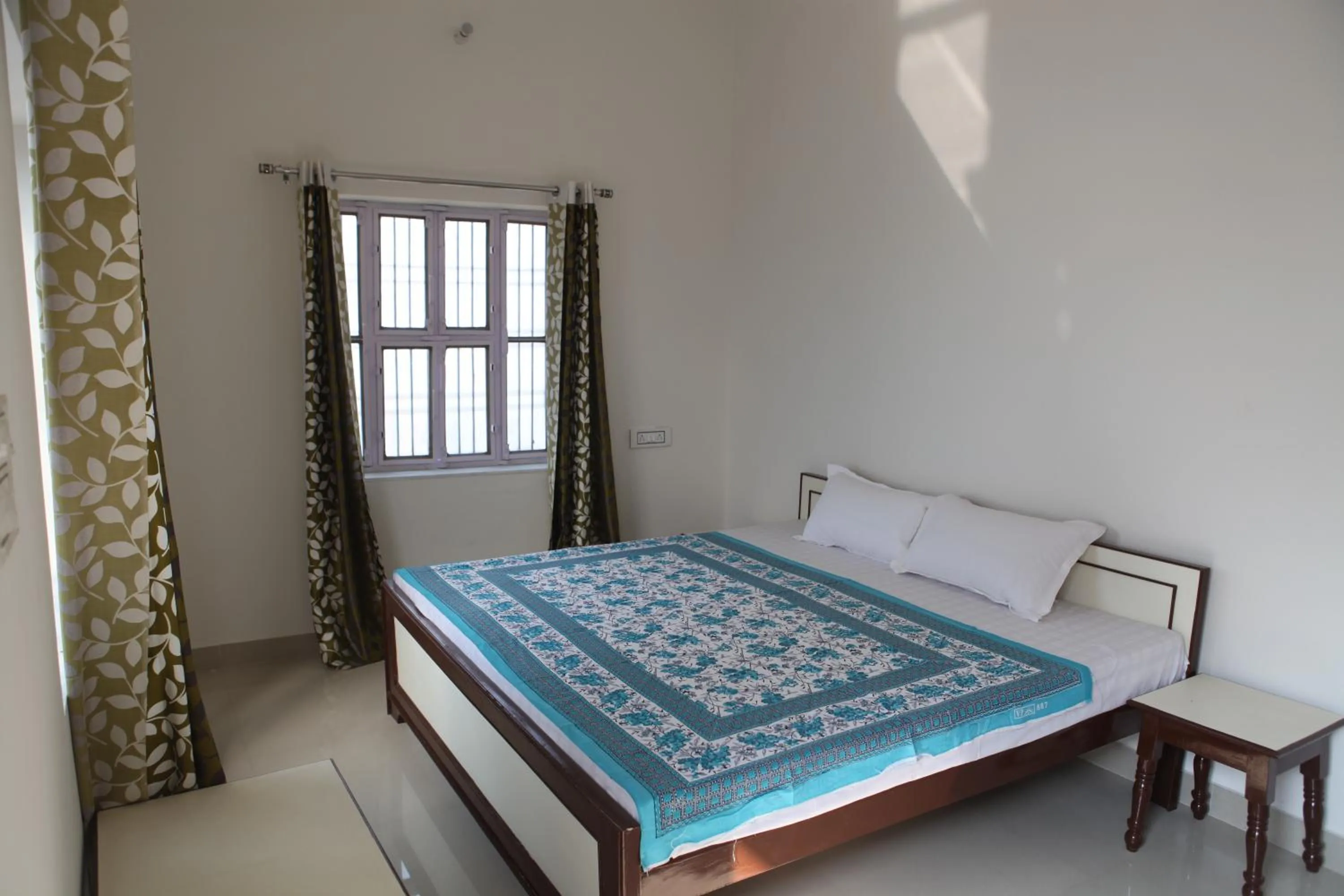 Bed in Keshav Palace -A Family Homestay