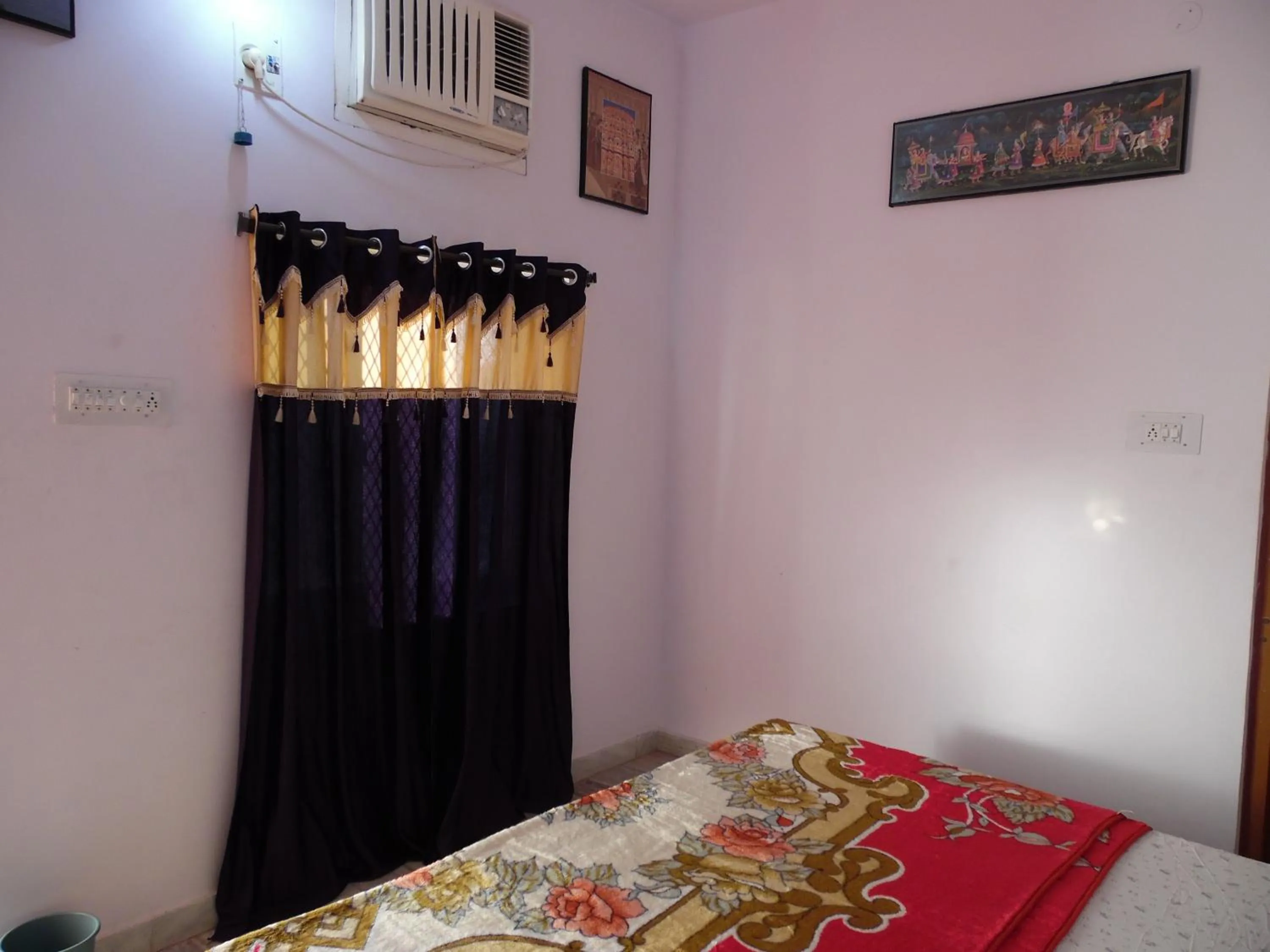 Bed in Keshav Palace -A Family Homestay