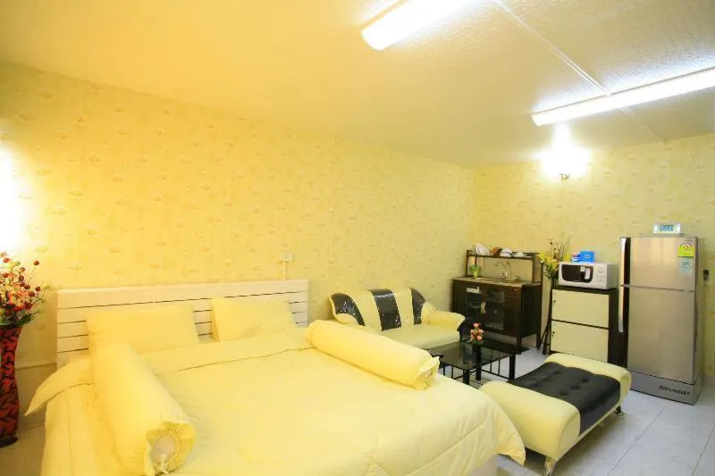 Photo of the whole room, Bed in Deluxe at Popular Condo