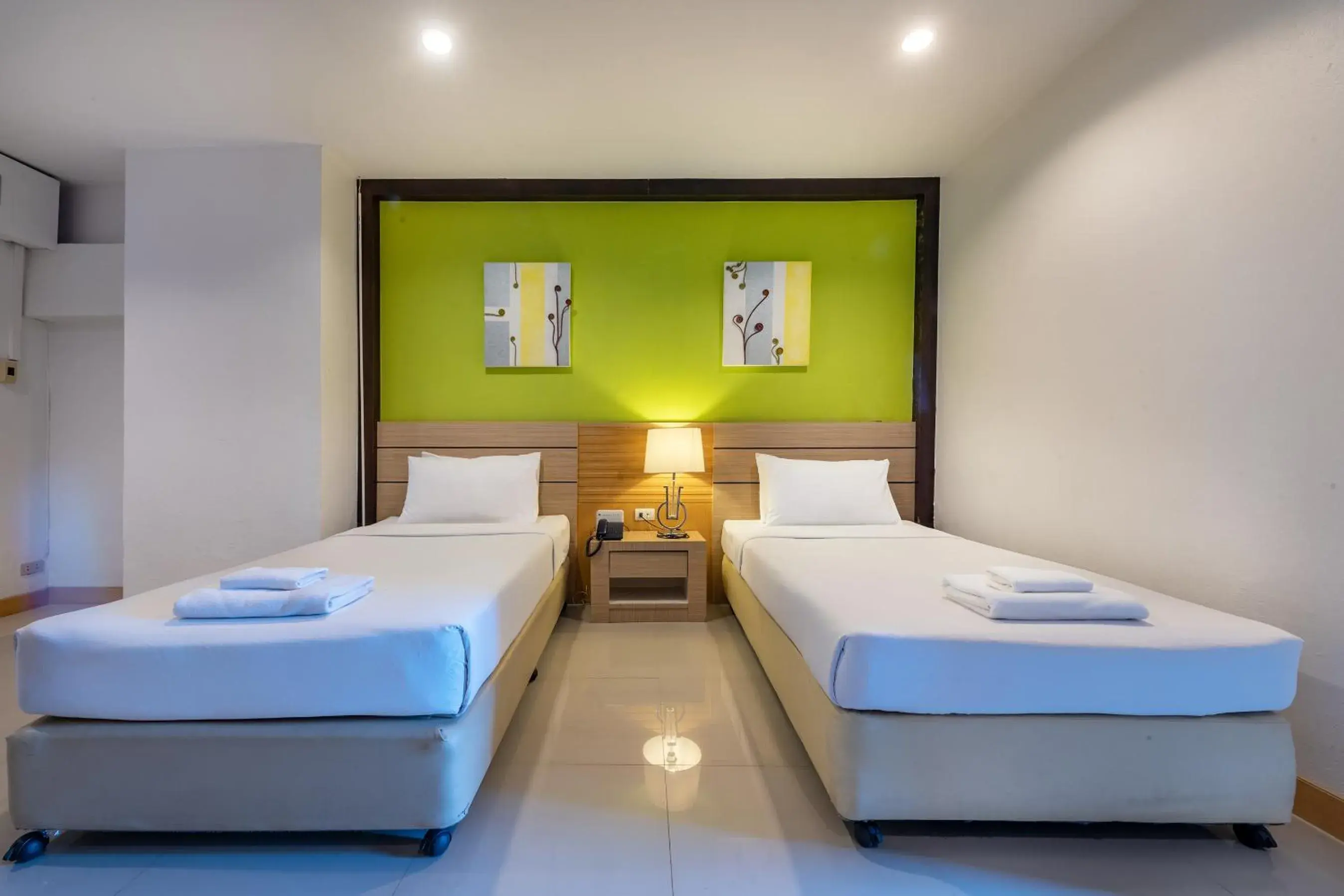 Bed in The Legacy Convention Hotel Bed in The Legacy Convention Hotel