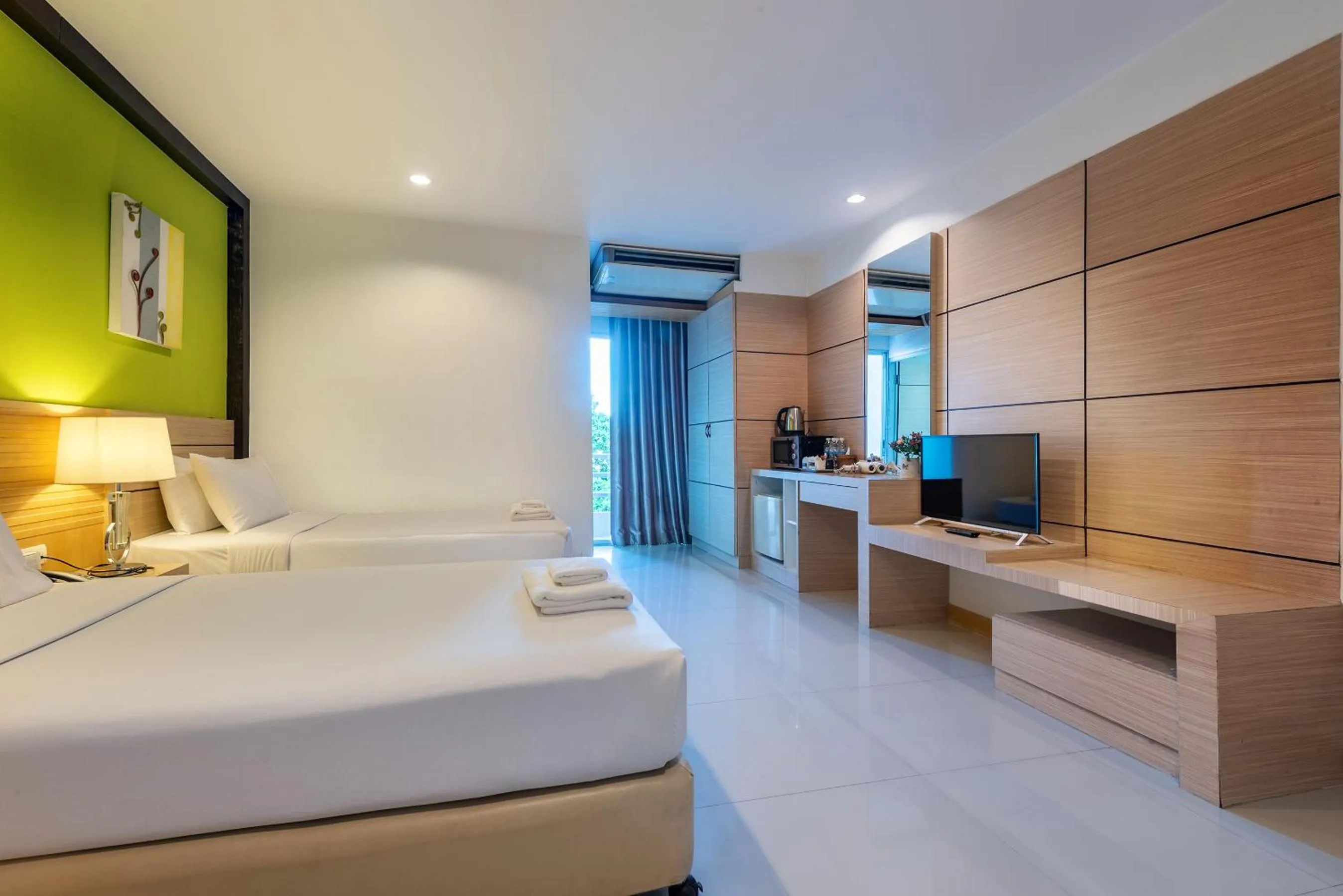 Bed in The Legacy Convention Hotel