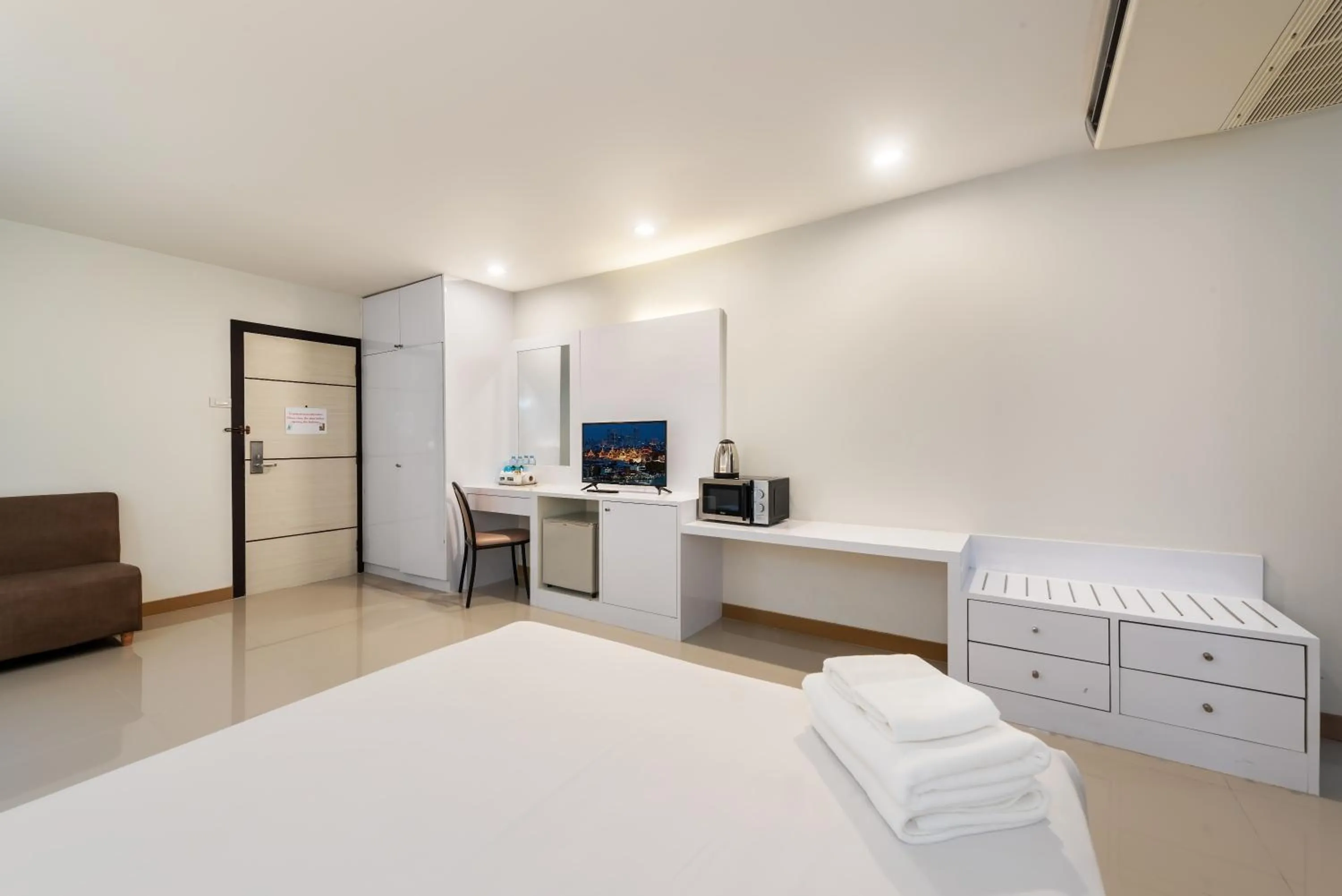 Bed in The Legacy Convention Hotel