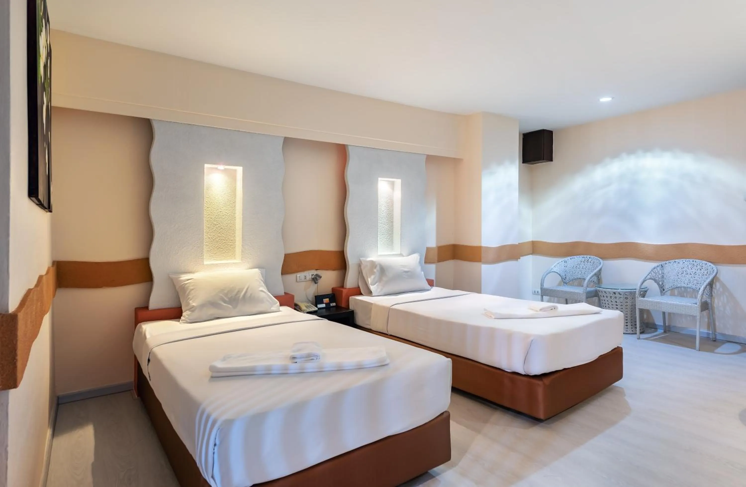 Bed in The Legacy Convention Hotel