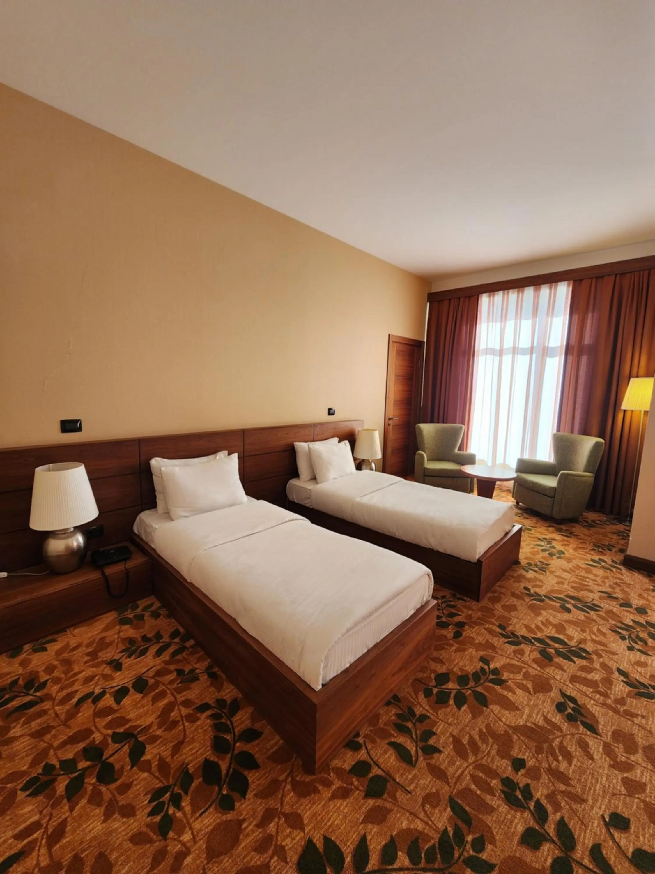 Bed in El Resort Hotel