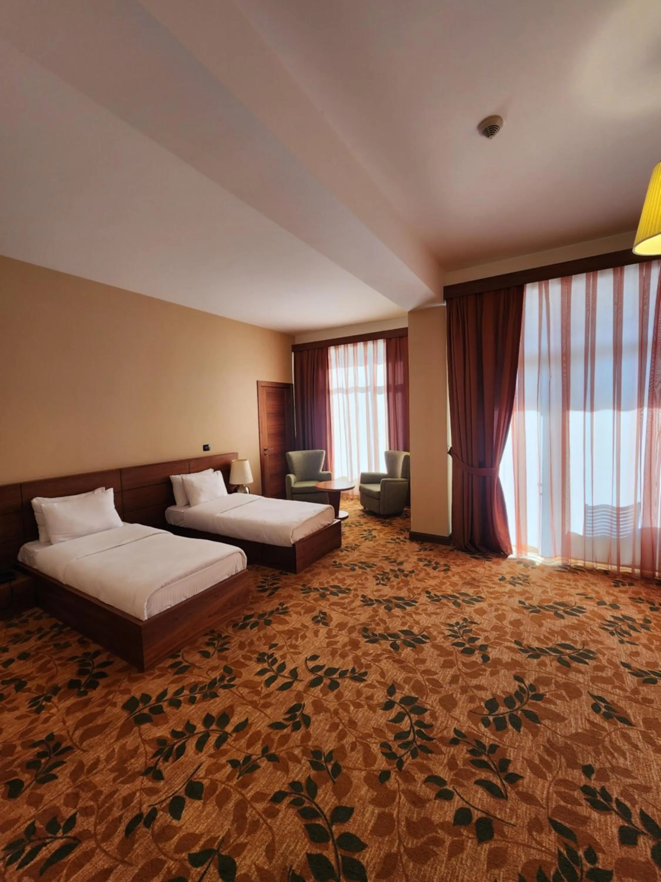 Bed in El Resort Hotel