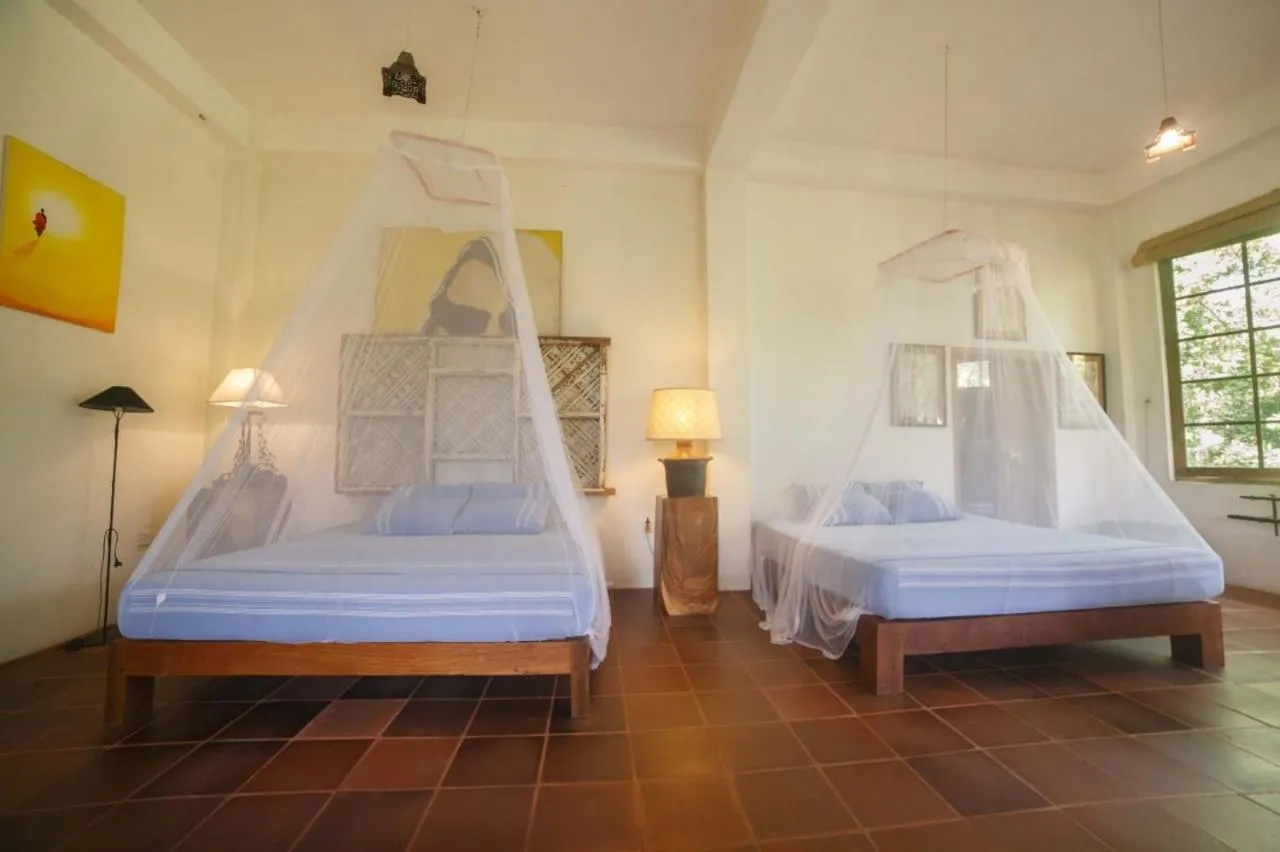 Photo of the whole room, Bed in The Kandy Samadhicentre