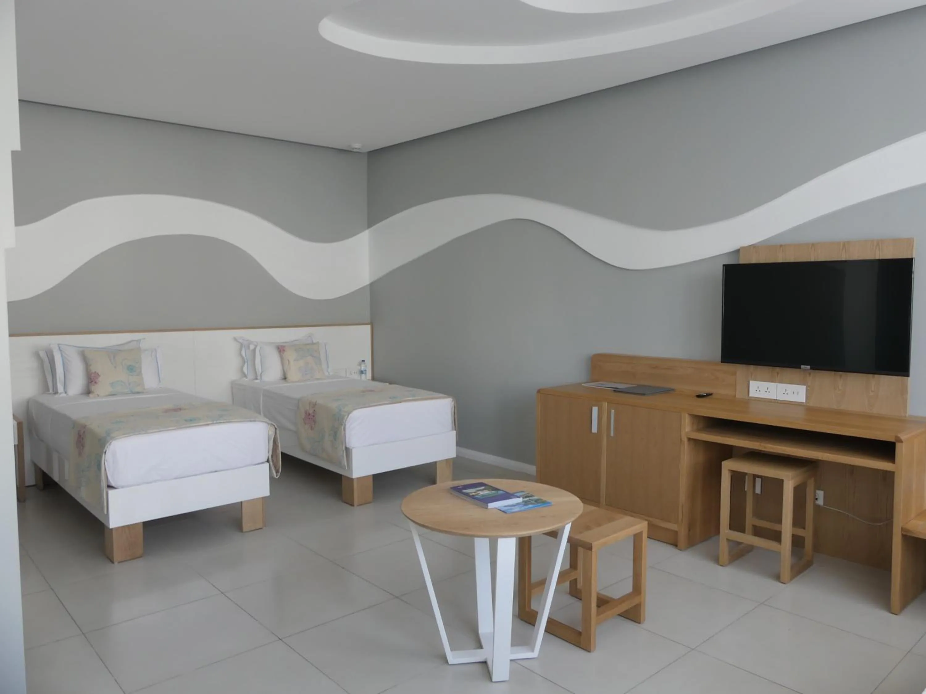 Bed in Baystone Boutique Hotel & Spa