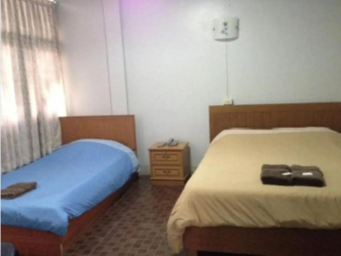 Bed in White Orchid Inn II