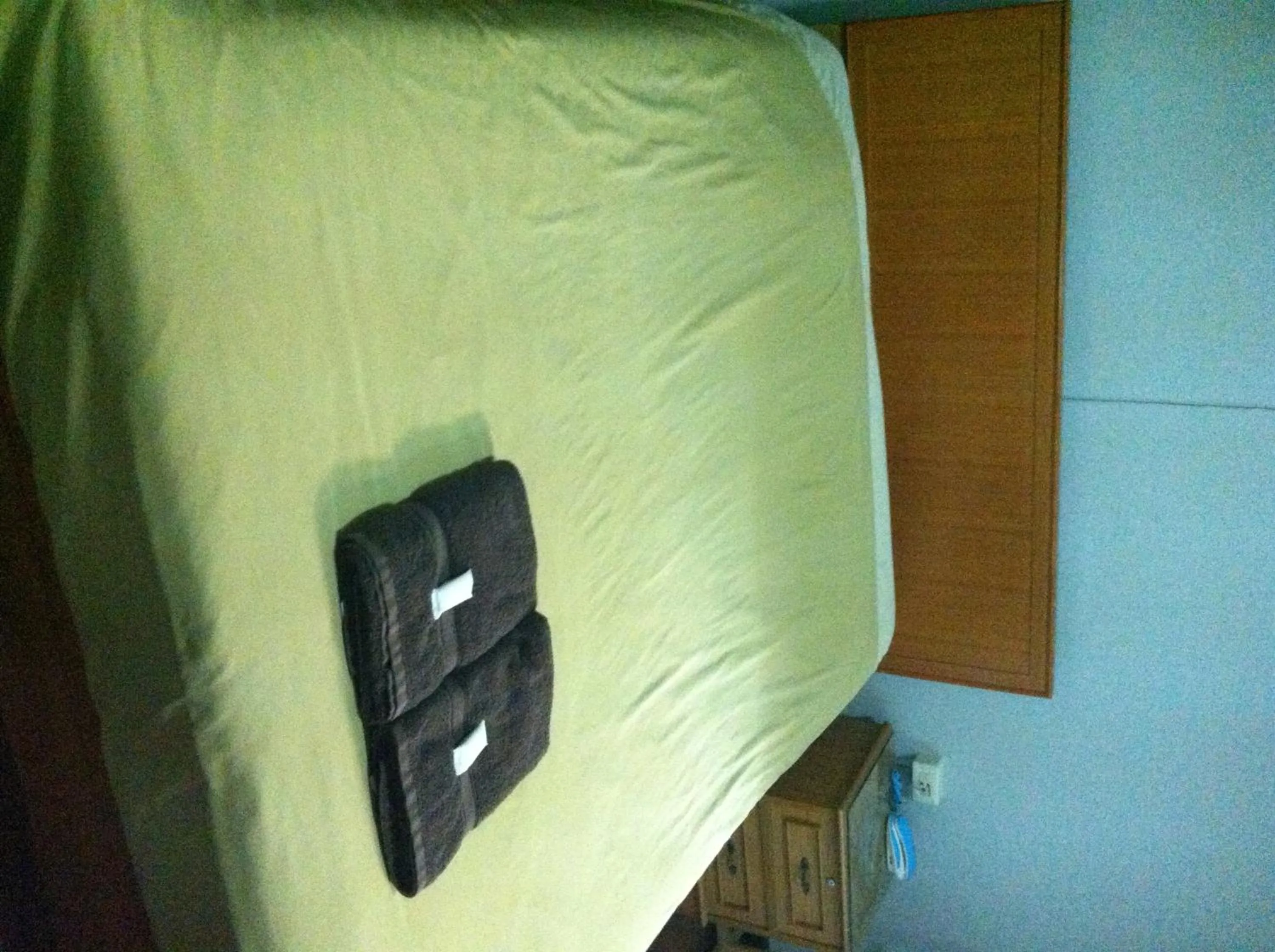 Bed in White Orchid Inn I