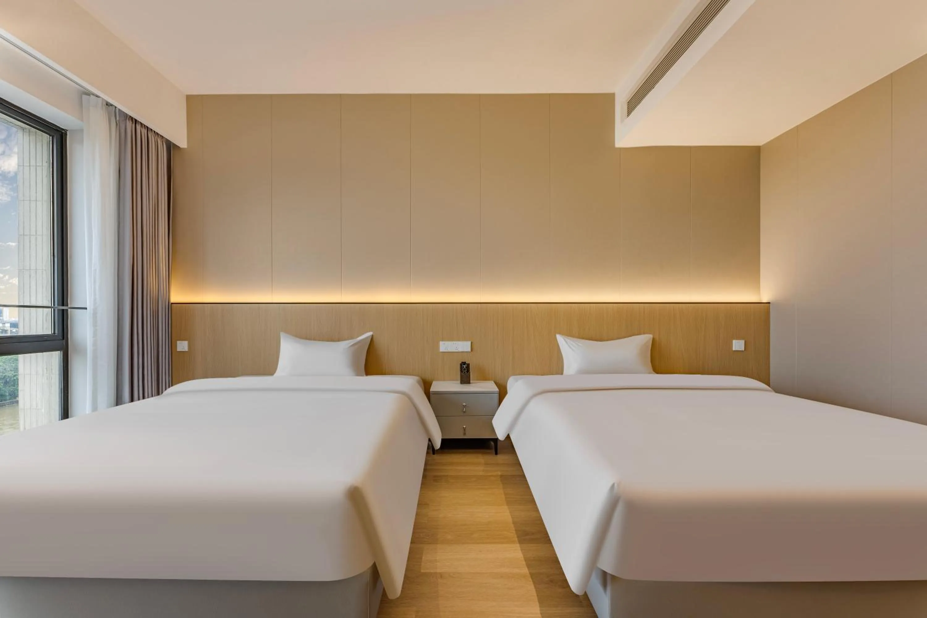 Bed in HeeFun Apartment GZ -Poly World Trading Center