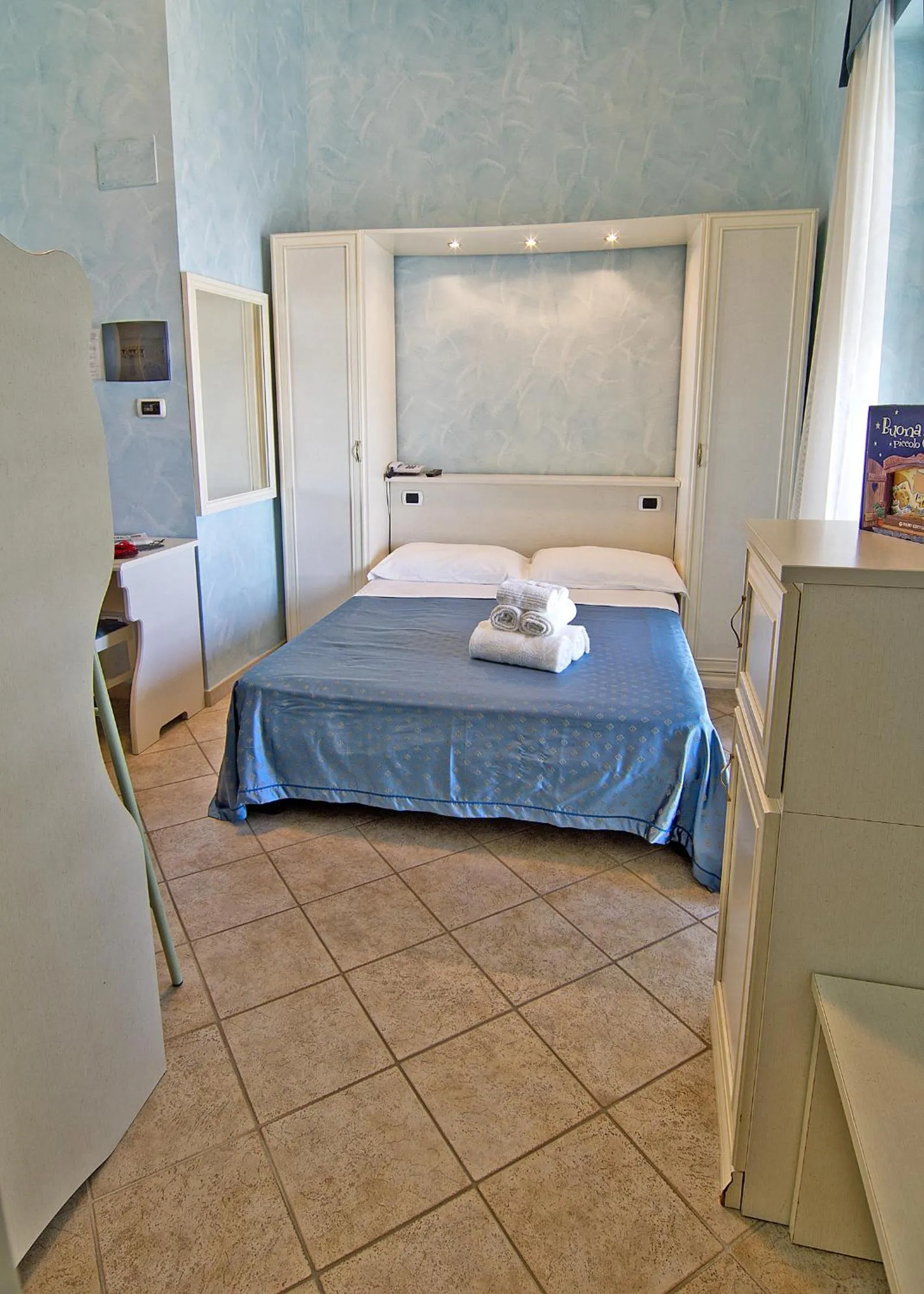 Bed in Hotel Capital