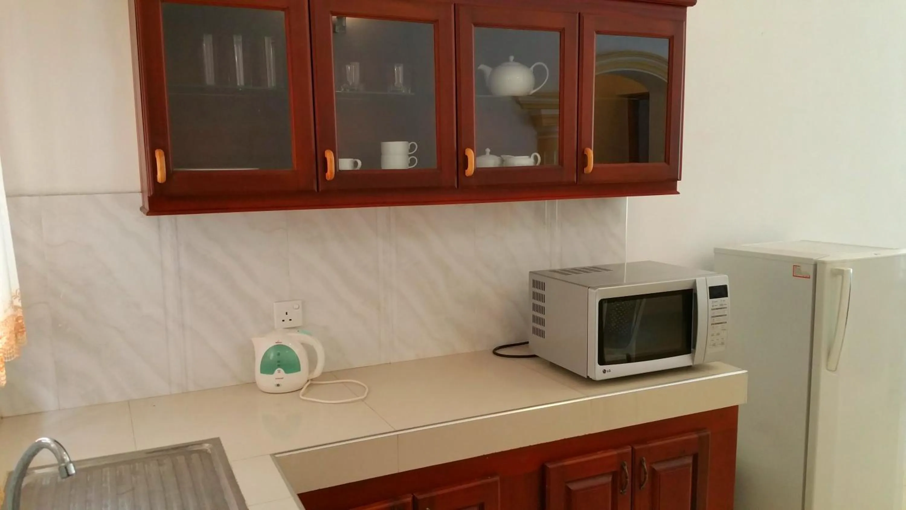 Kitchen or kitchenette in Holiday Fashion Inn