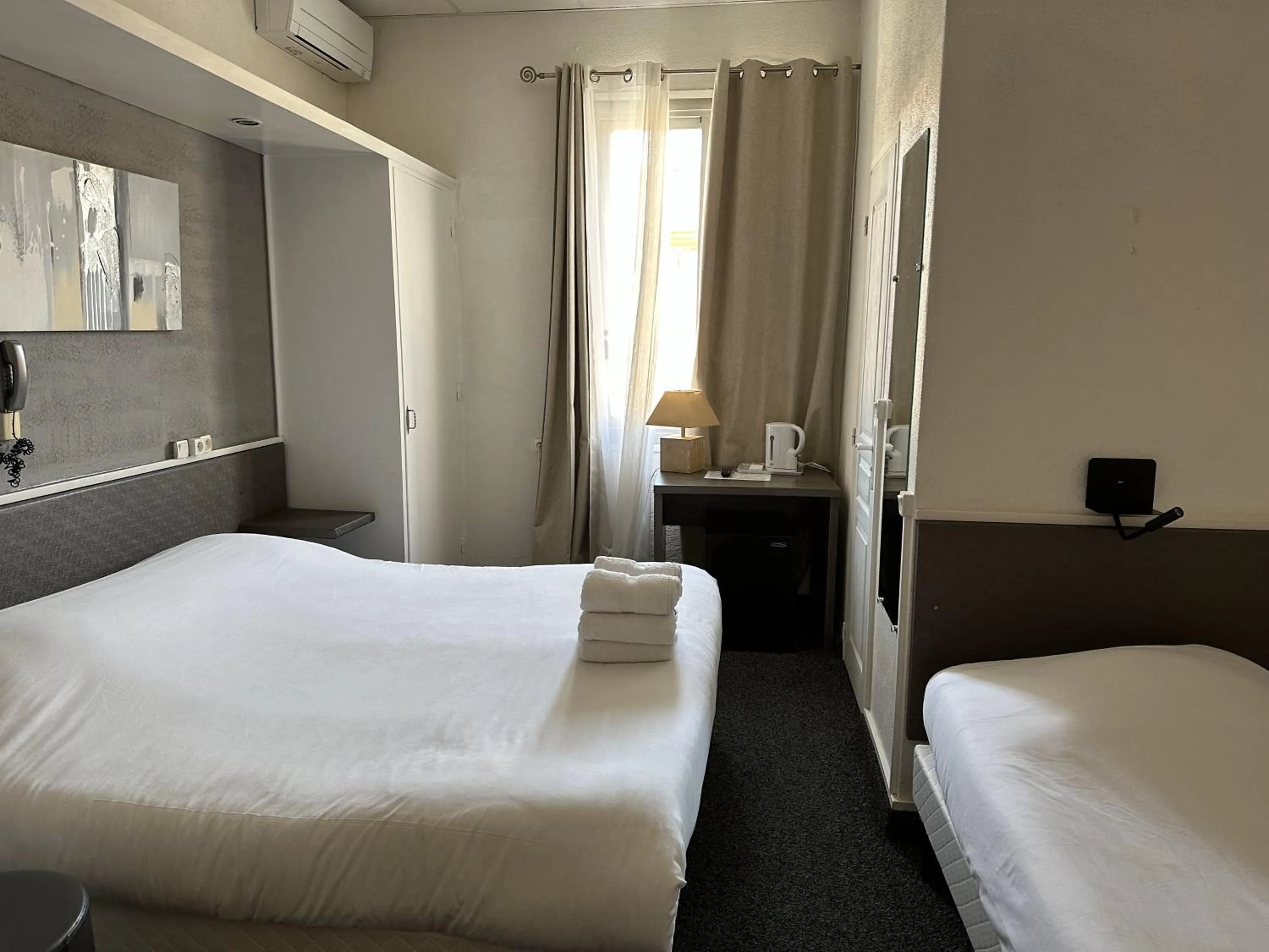 Bed in Hôtel le Chardon Bleu