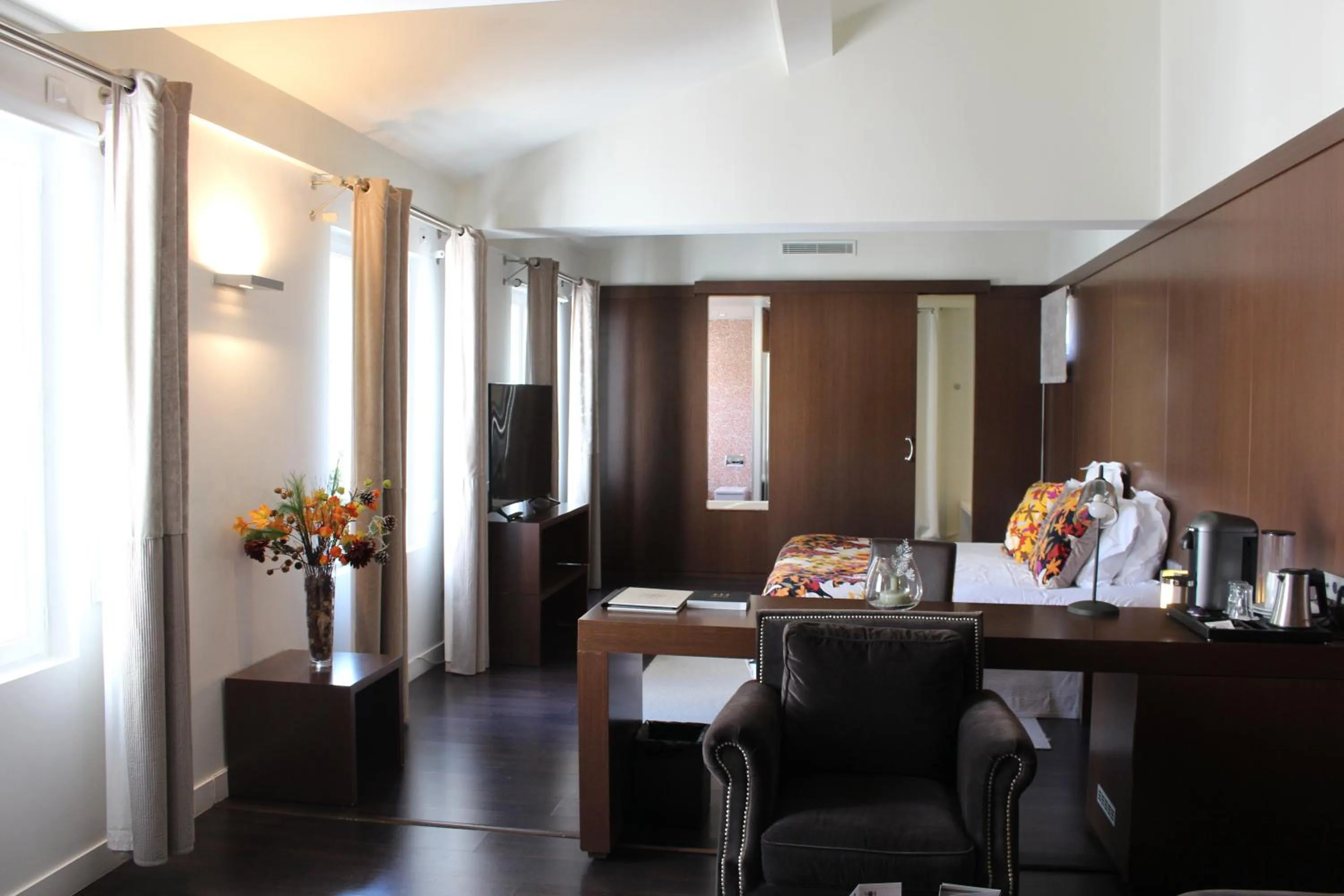 Bedroom in Les Pleiades Hôtel-Spa-Restaurant