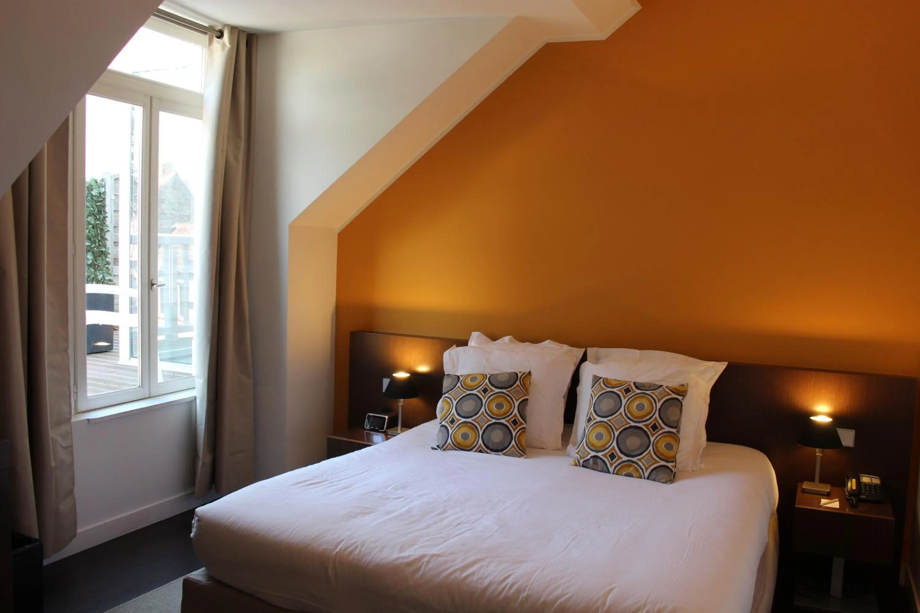 Bedroom in Les Pleiades Hôtel-Spa-Restaurant