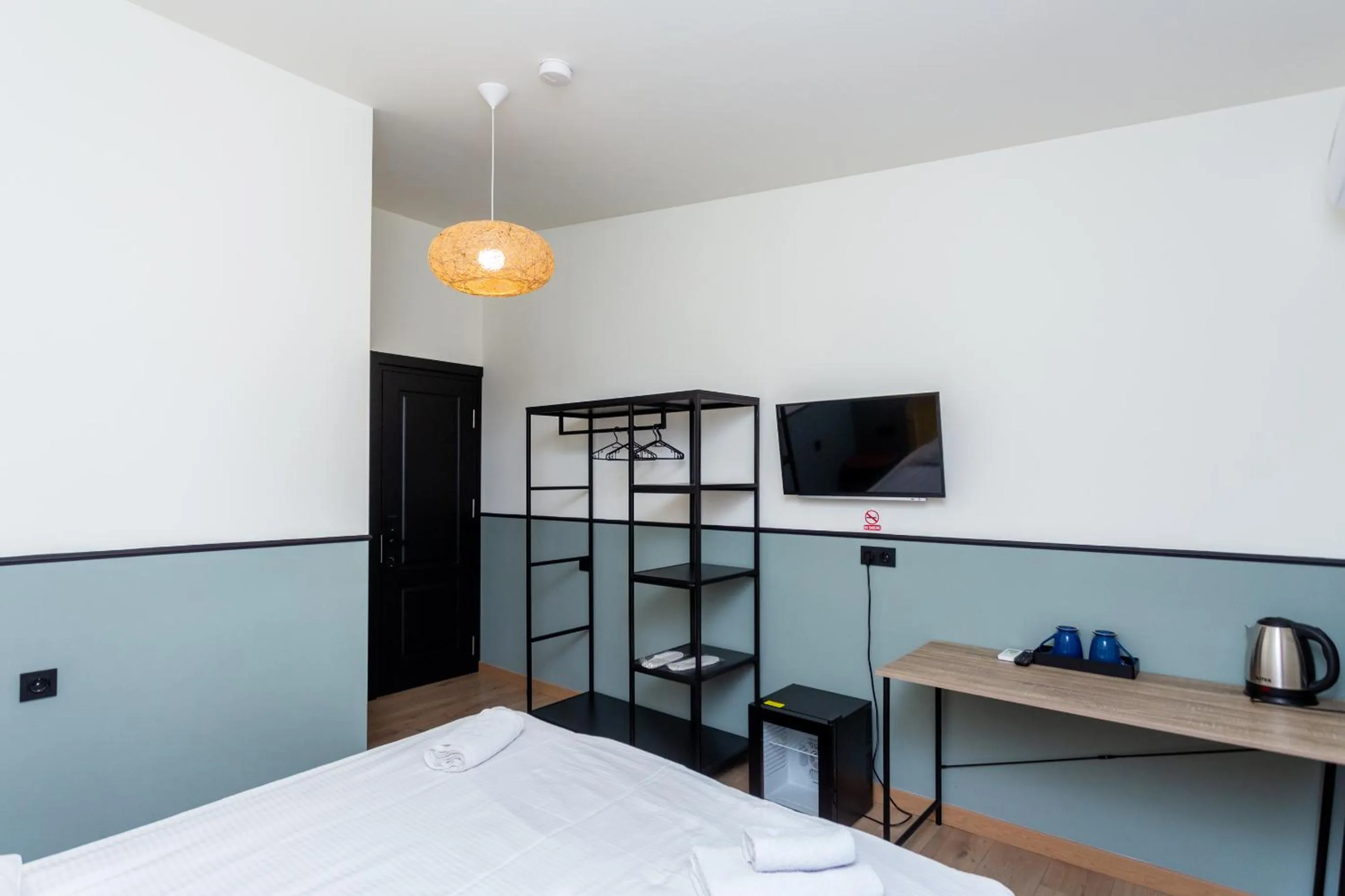 Bed in Shota Rustaveli Aparthotel