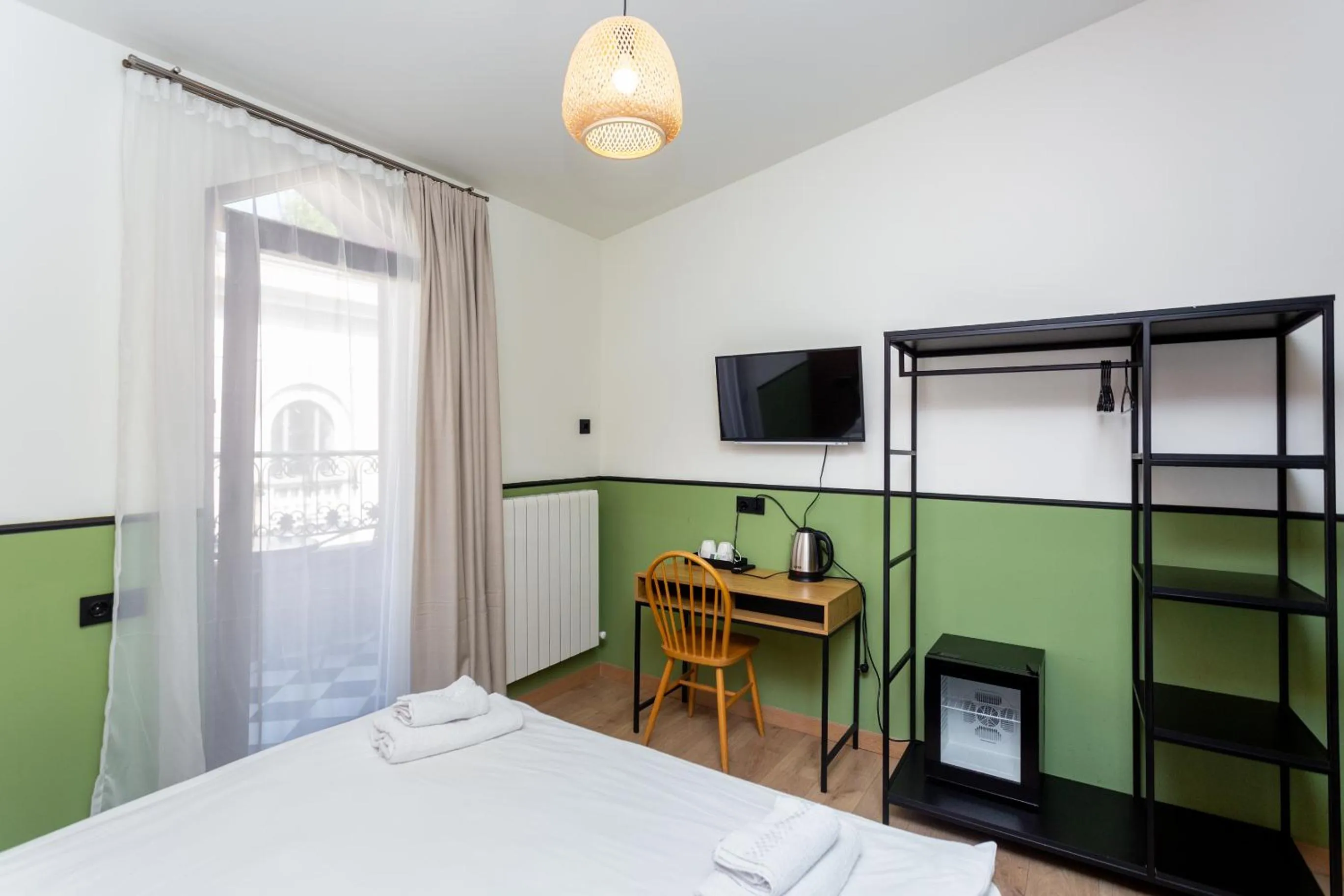 Bed in Shota Rustaveli Aparthotel