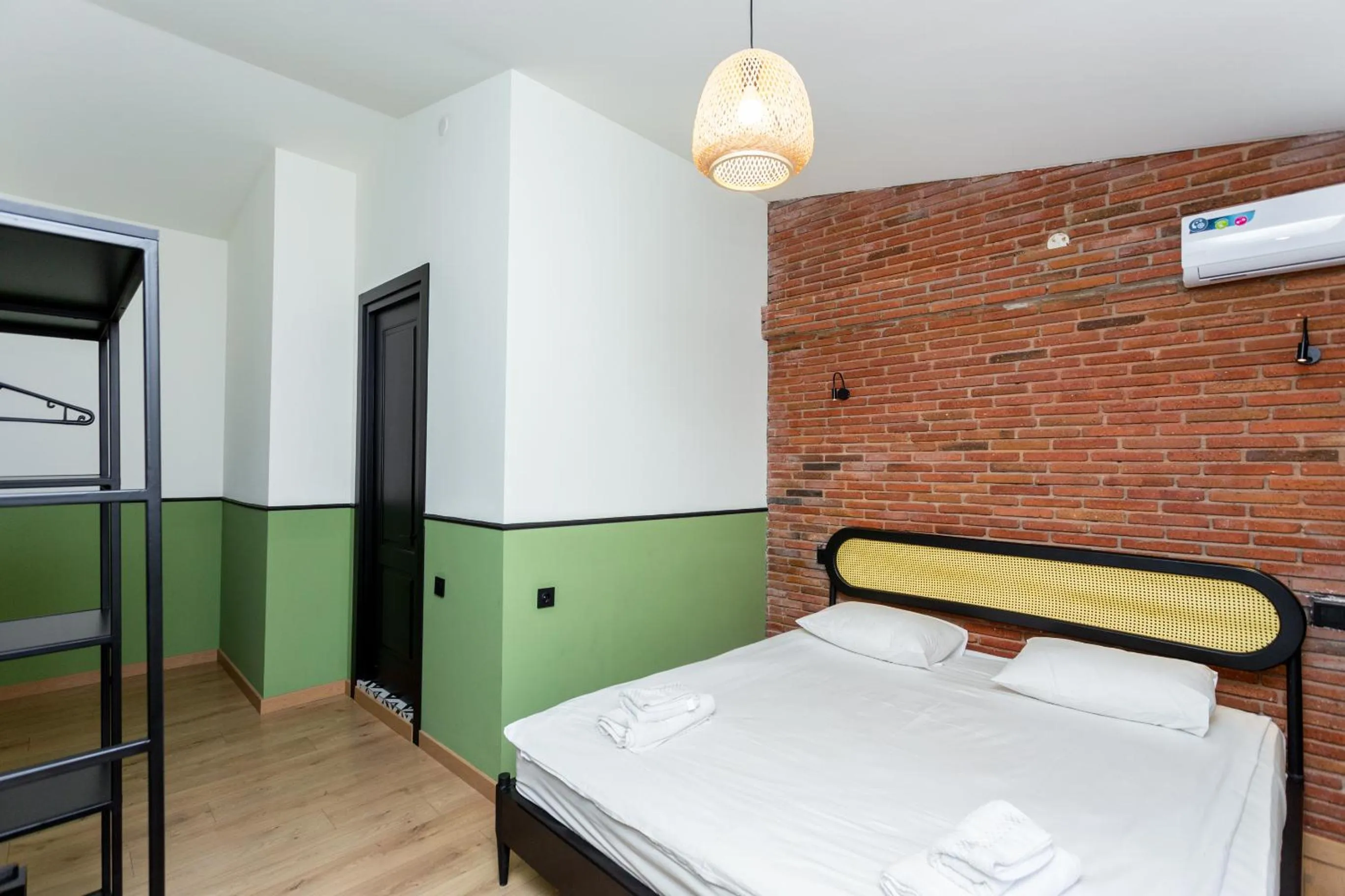 Bed in Shota Rustaveli Aparthotel