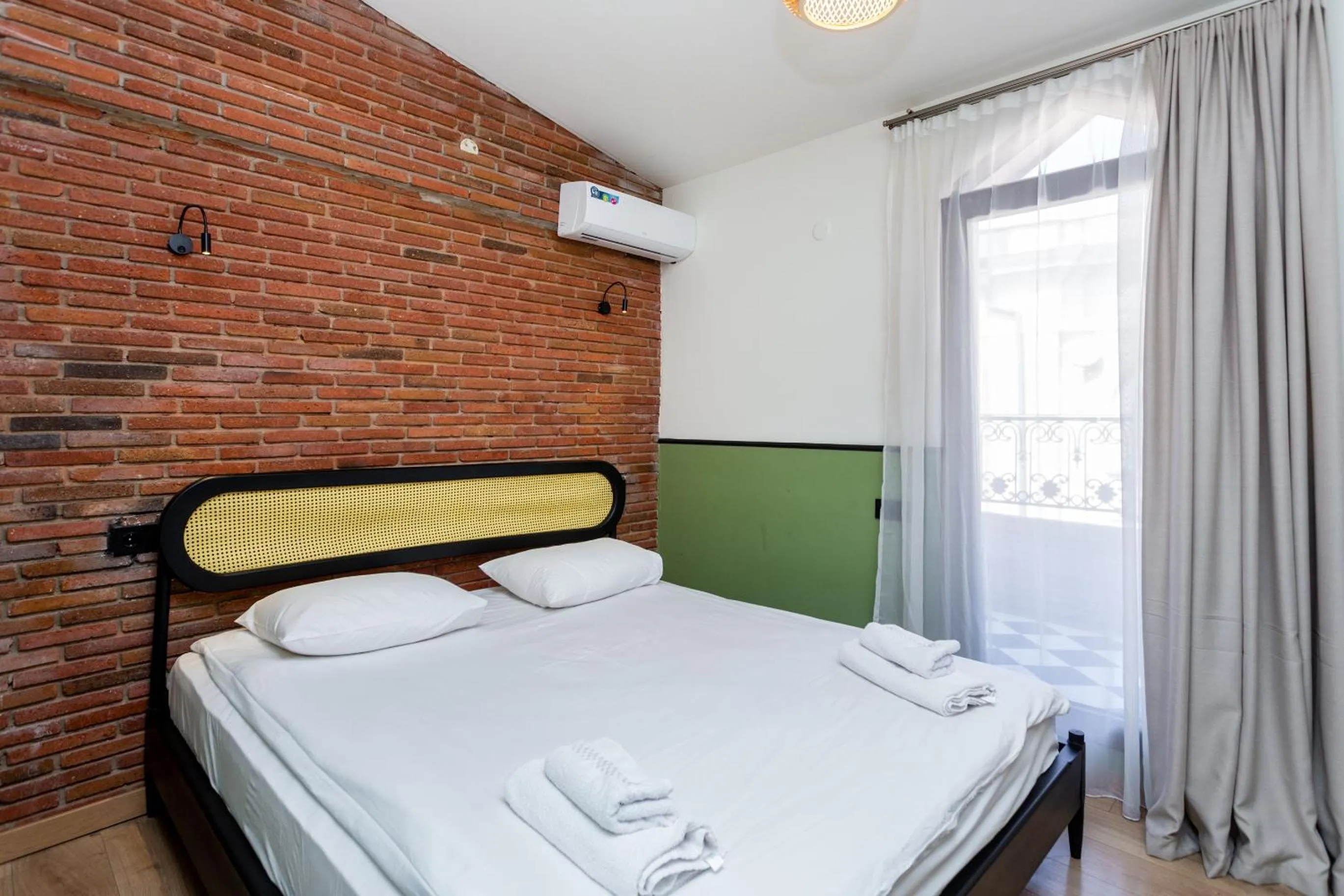 Bed in Shota Rustaveli Aparthotel