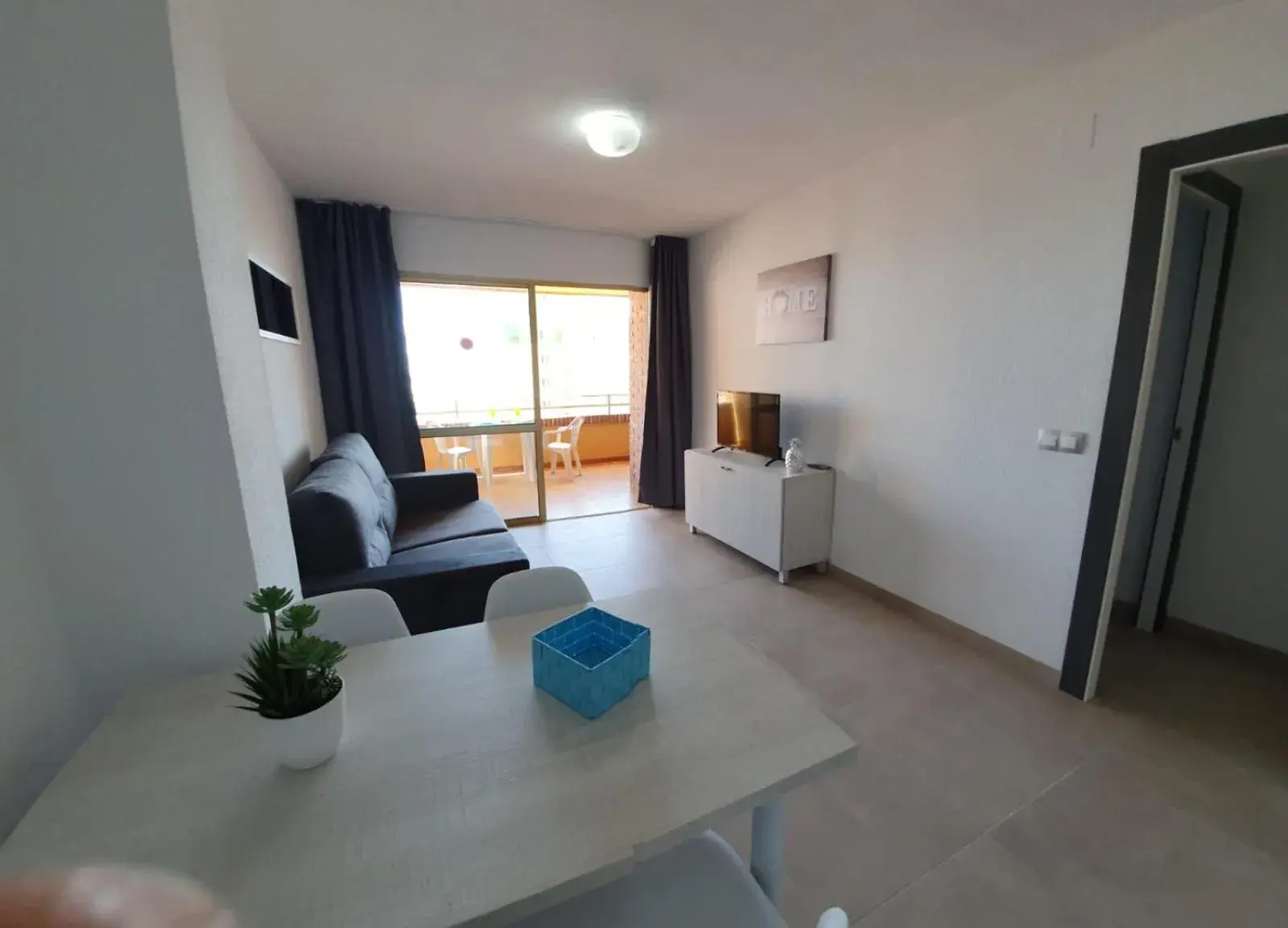 Living room in Trebol One Apartments By Mc Living room in Trebol One Apartments By Mc