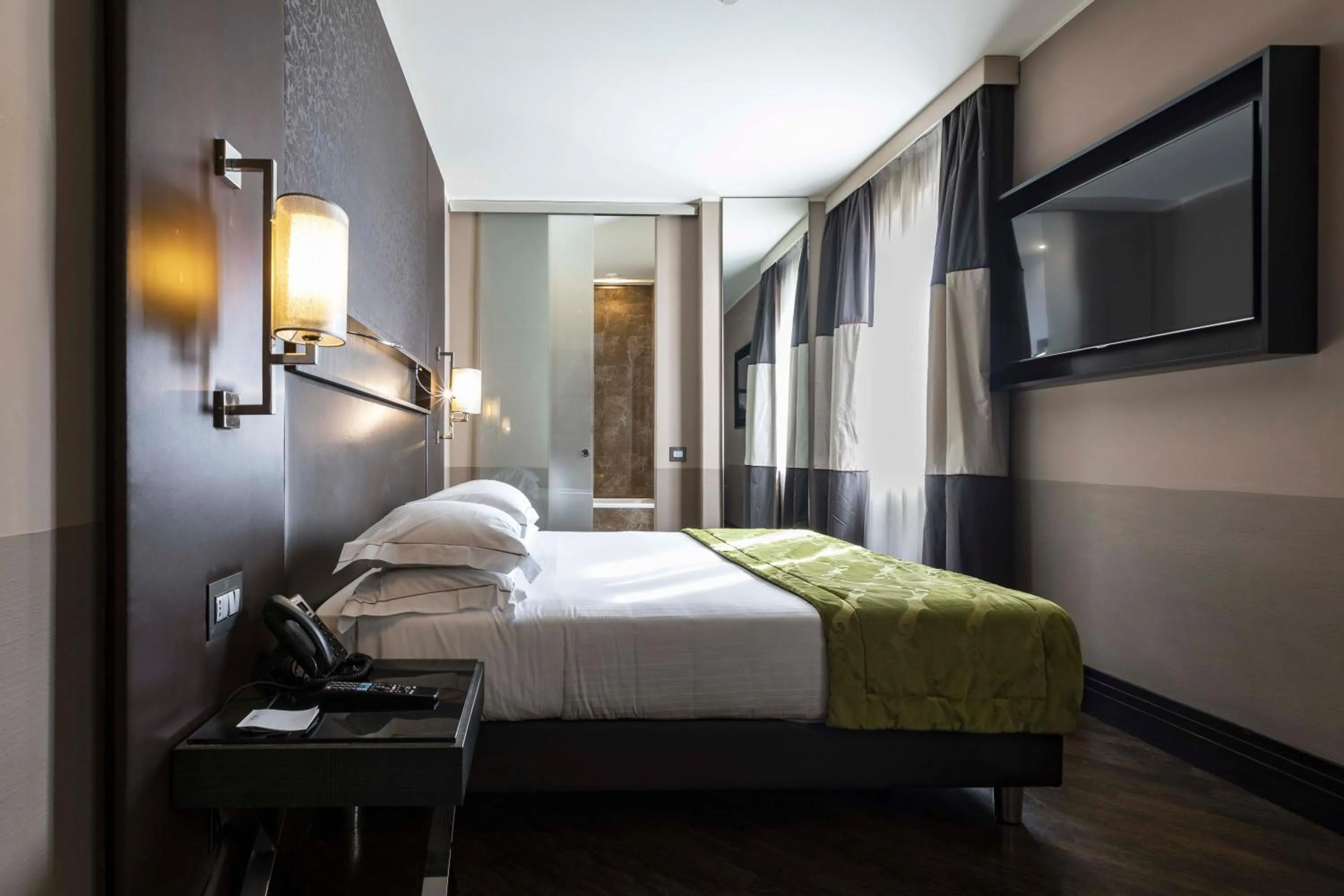 Bed in Rome Times Hotel