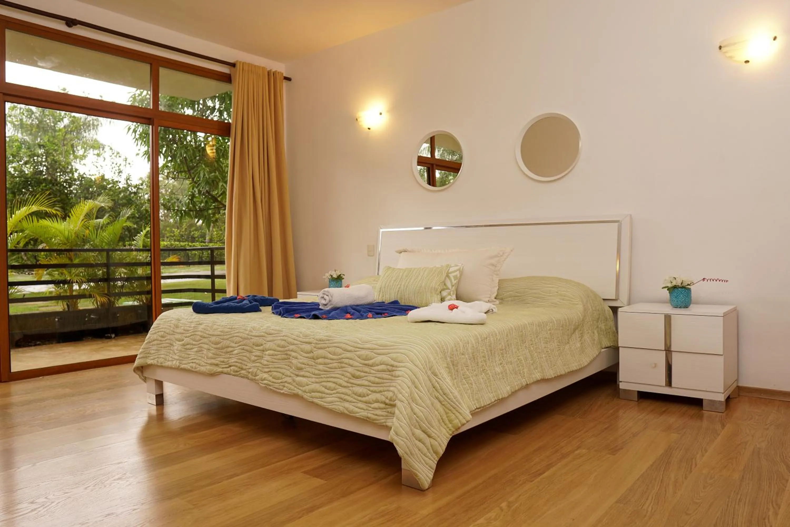 Bed in Sybaris Suites & Residences