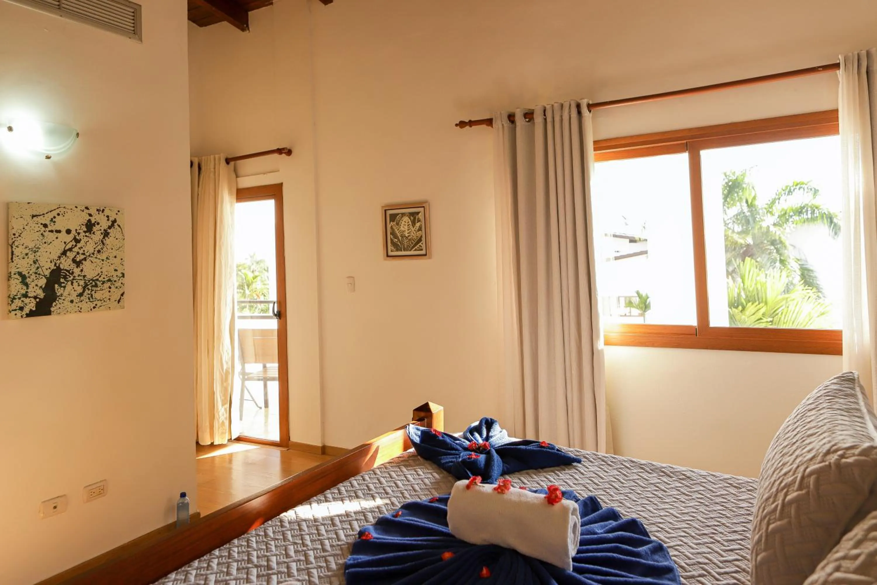 Bed in Sybaris Suites & Residences