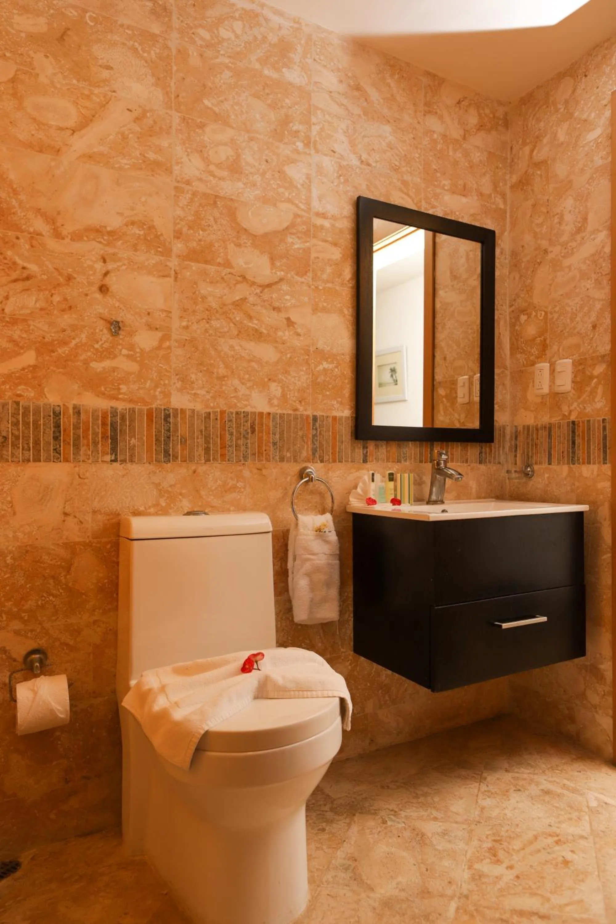 Bathroom in Sybaris Suites & Residences