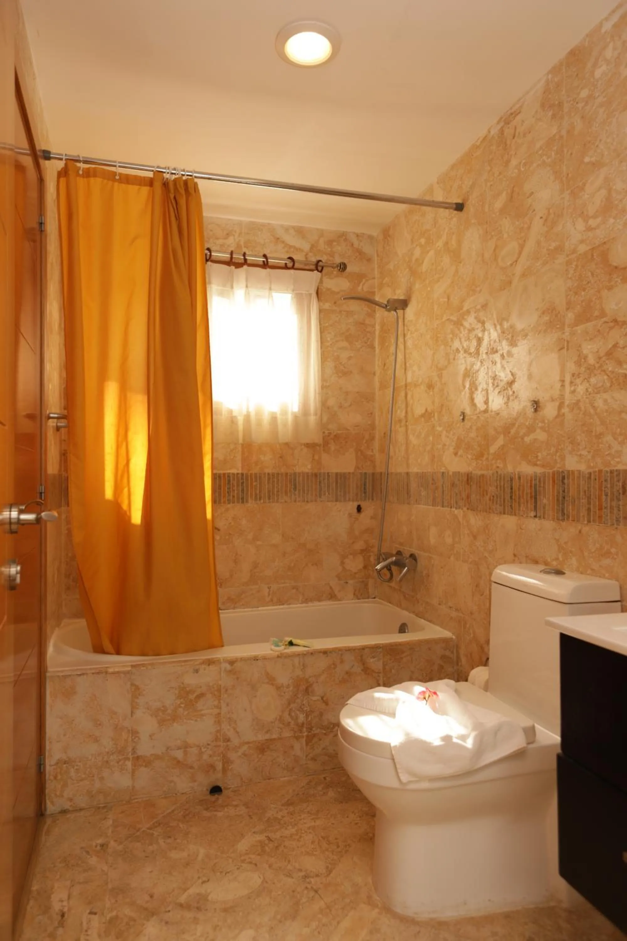 Bathroom in Sybaris Suites & Residences