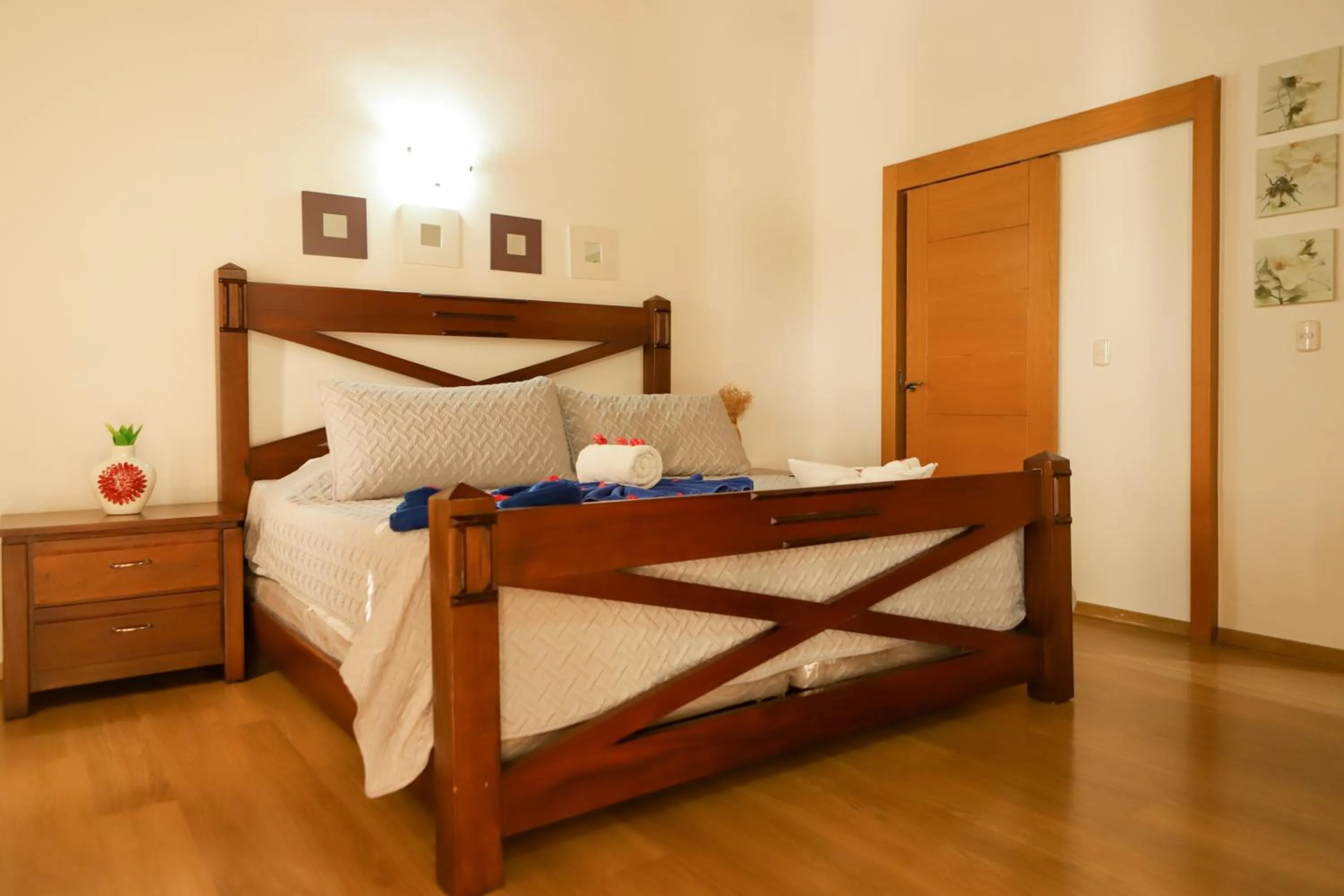 Bed in Sybaris Suites & Residences