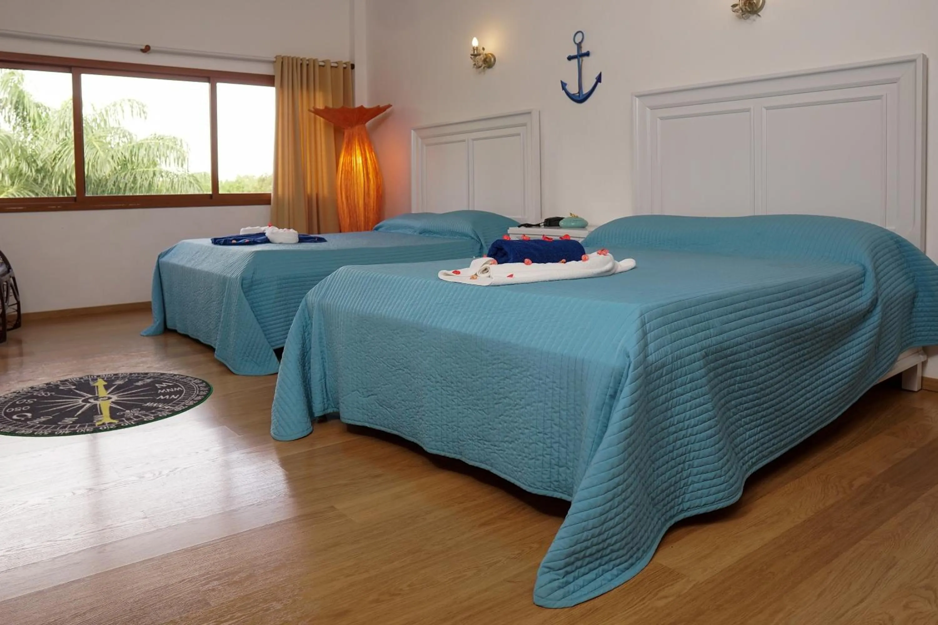 Bed in Sybaris Suites & Residences
