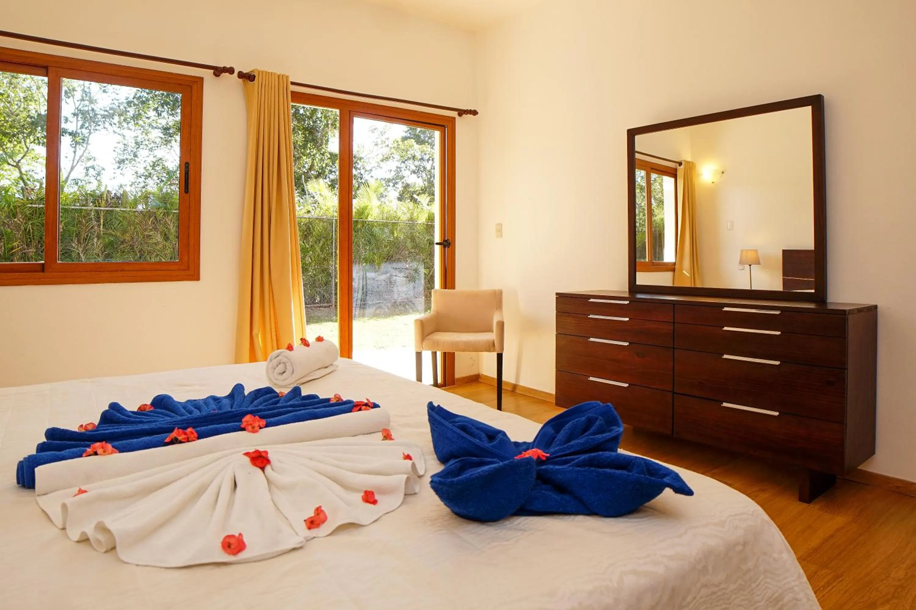 Bed in Sybaris Suites & Residences