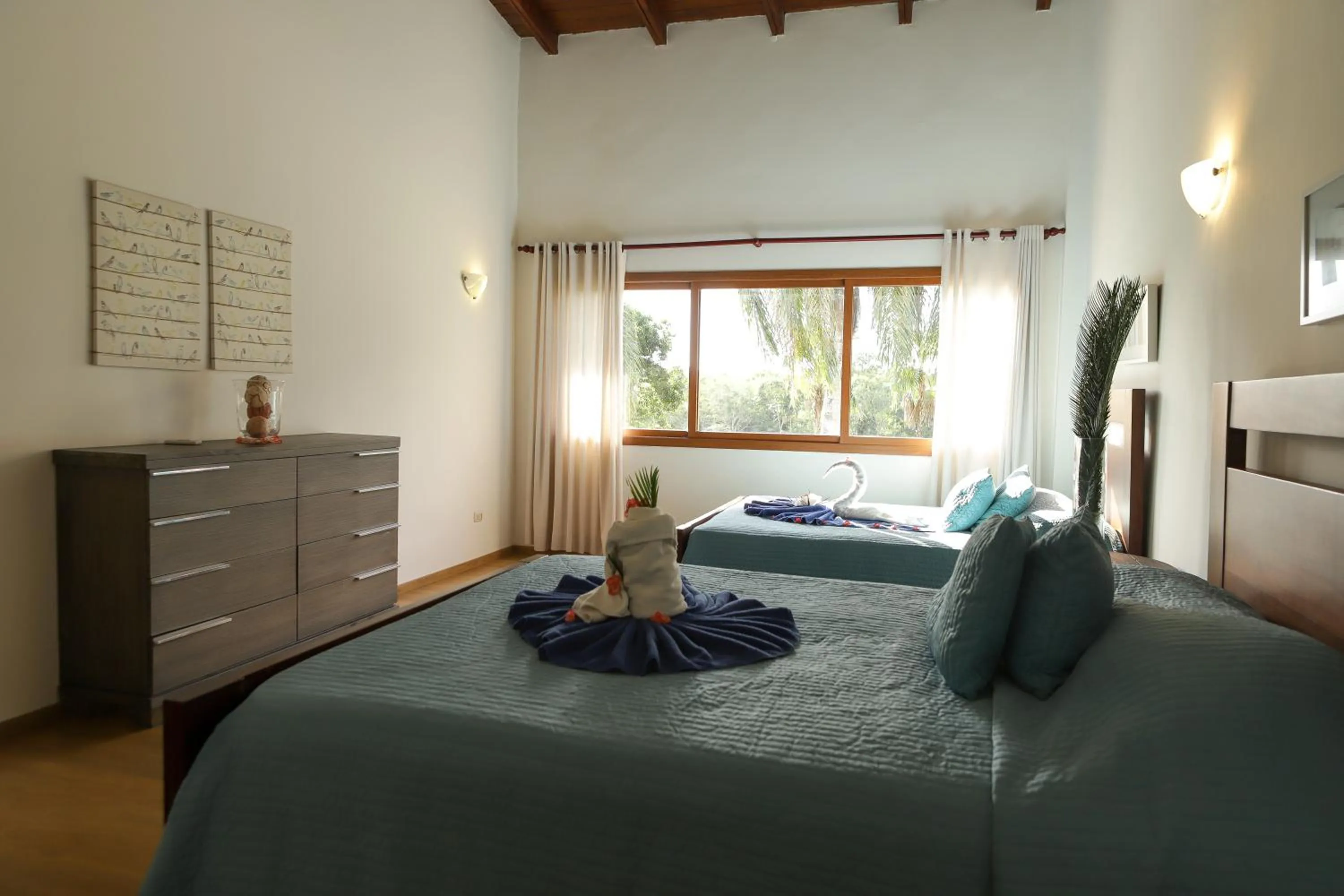 Bed in Sybaris Suites & Residences