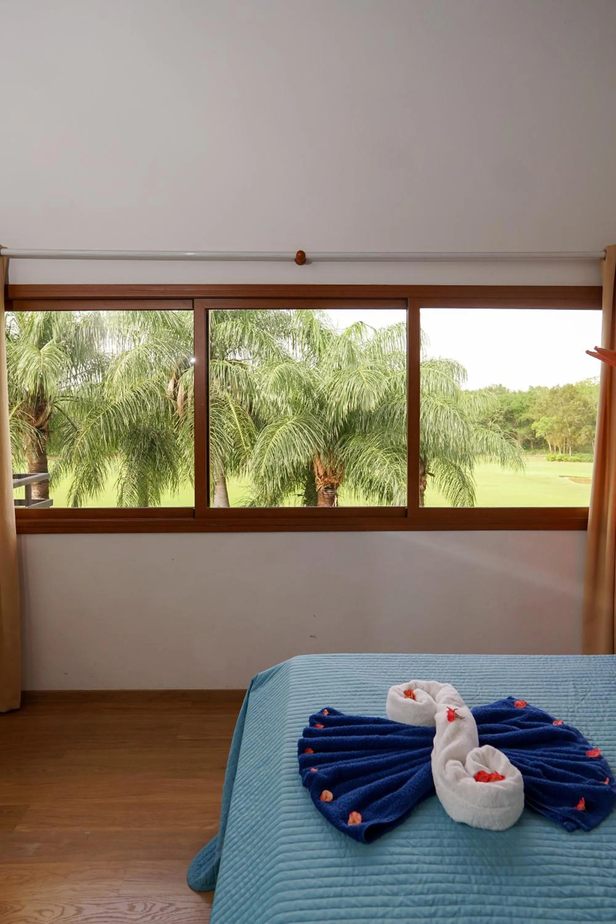 Bed in Sybaris Suites & Residences