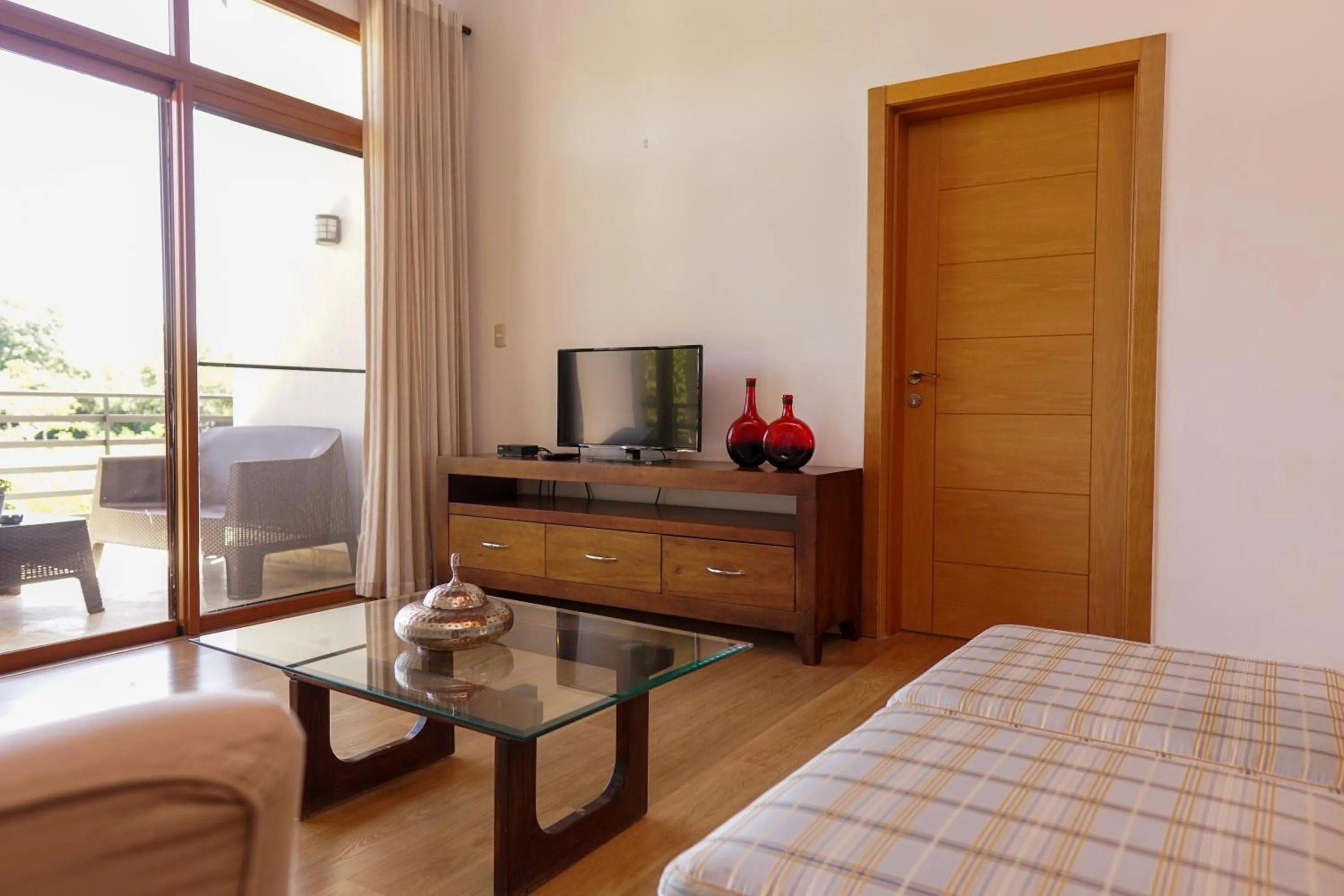 Bed in Sybaris Suites & Residences