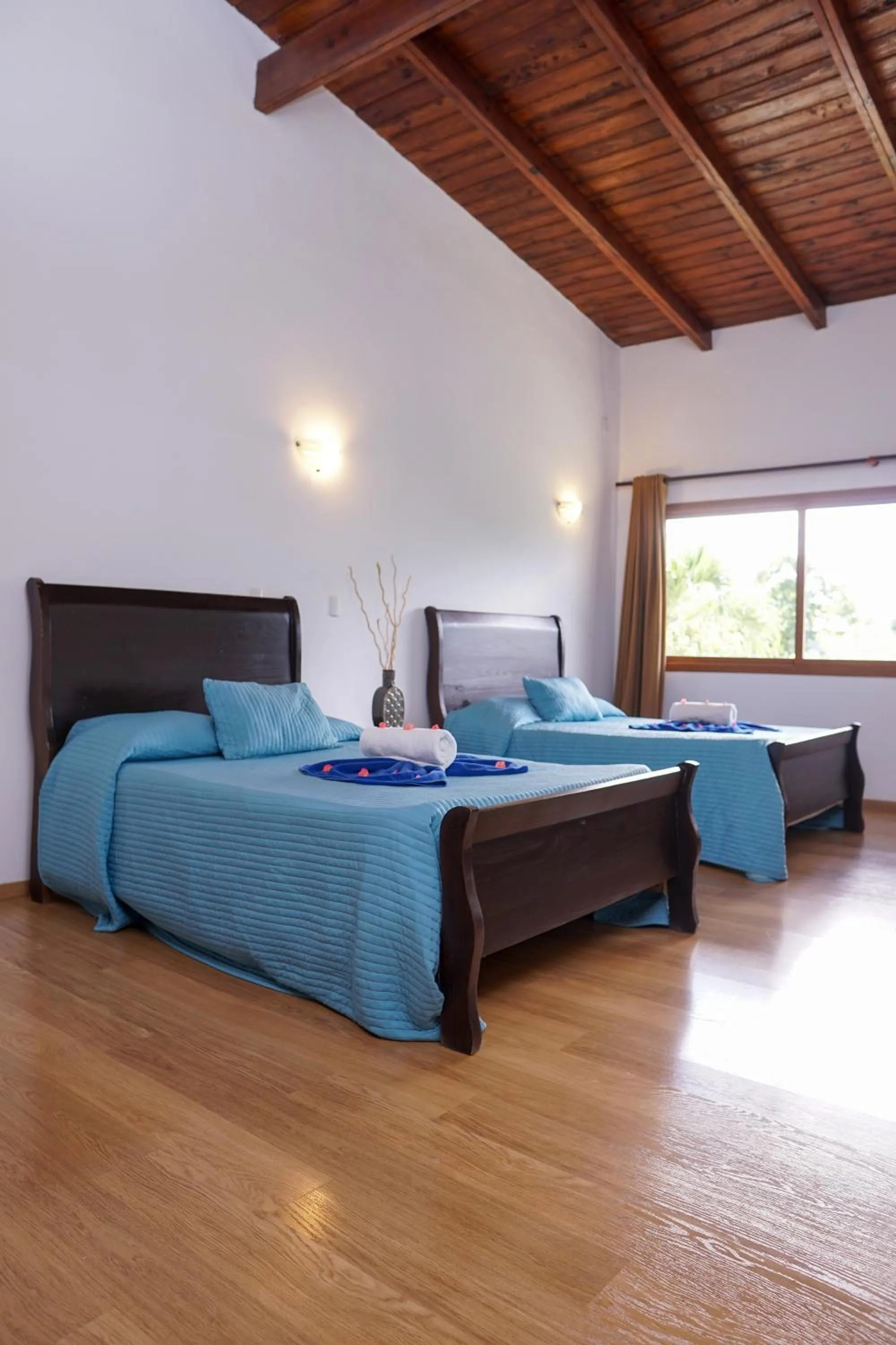 Bed in Sybaris Suites & Residences