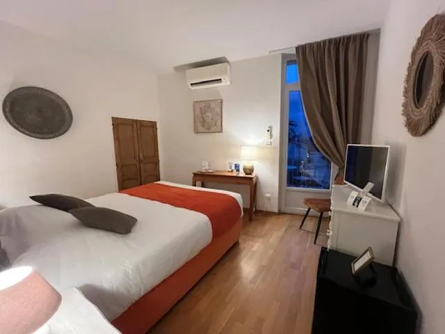Photo of the whole room, Bed in Logis Hôtel La Bastide des Monges