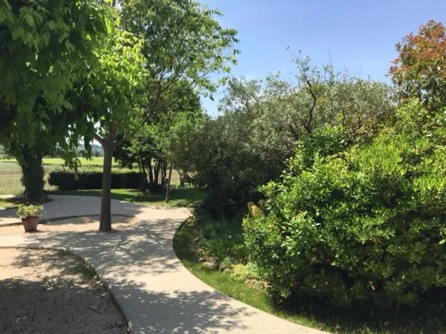 Garden in Logis Hôtel La Bastide des Monges
