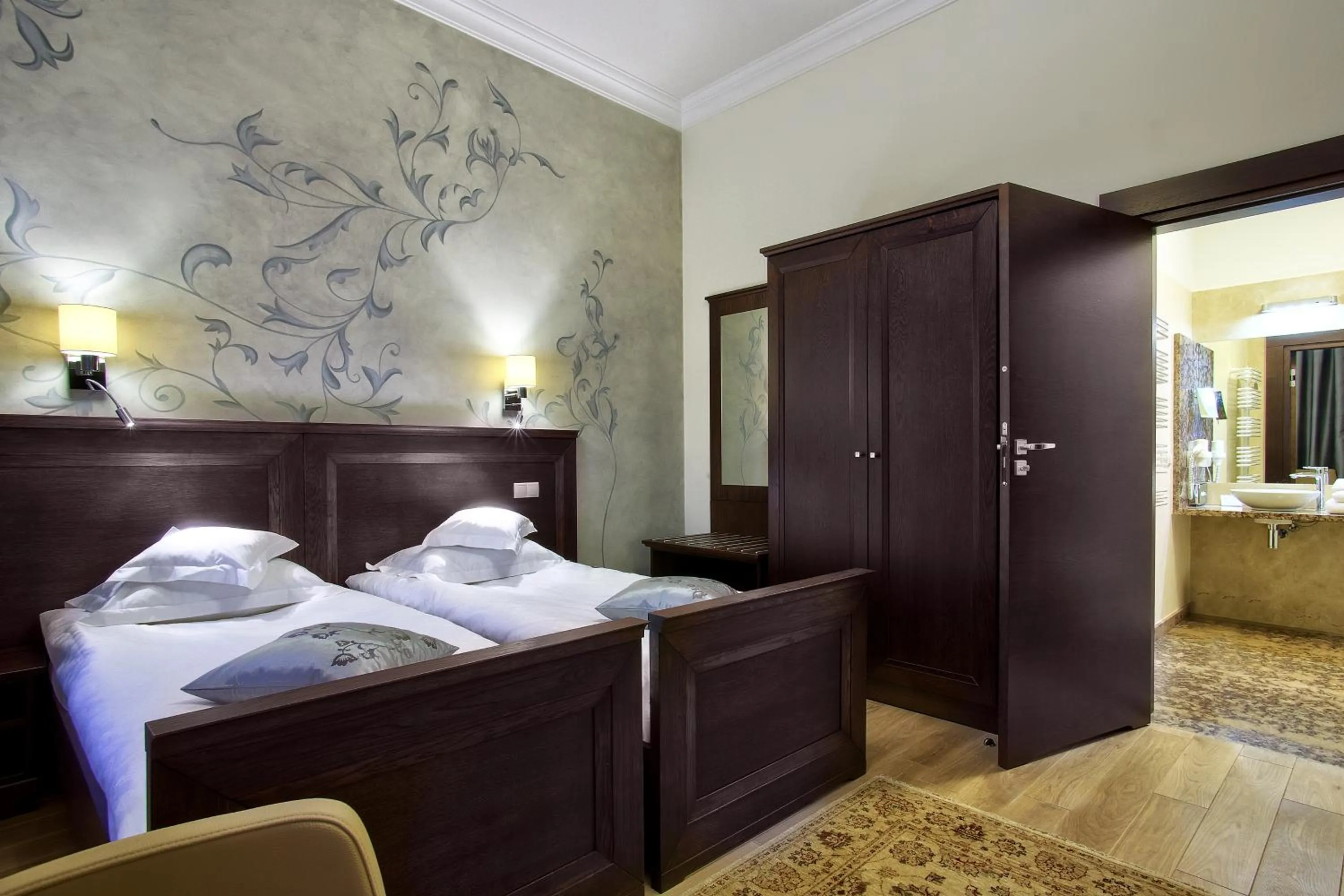 Bed in BoutiqueHotel Aristo