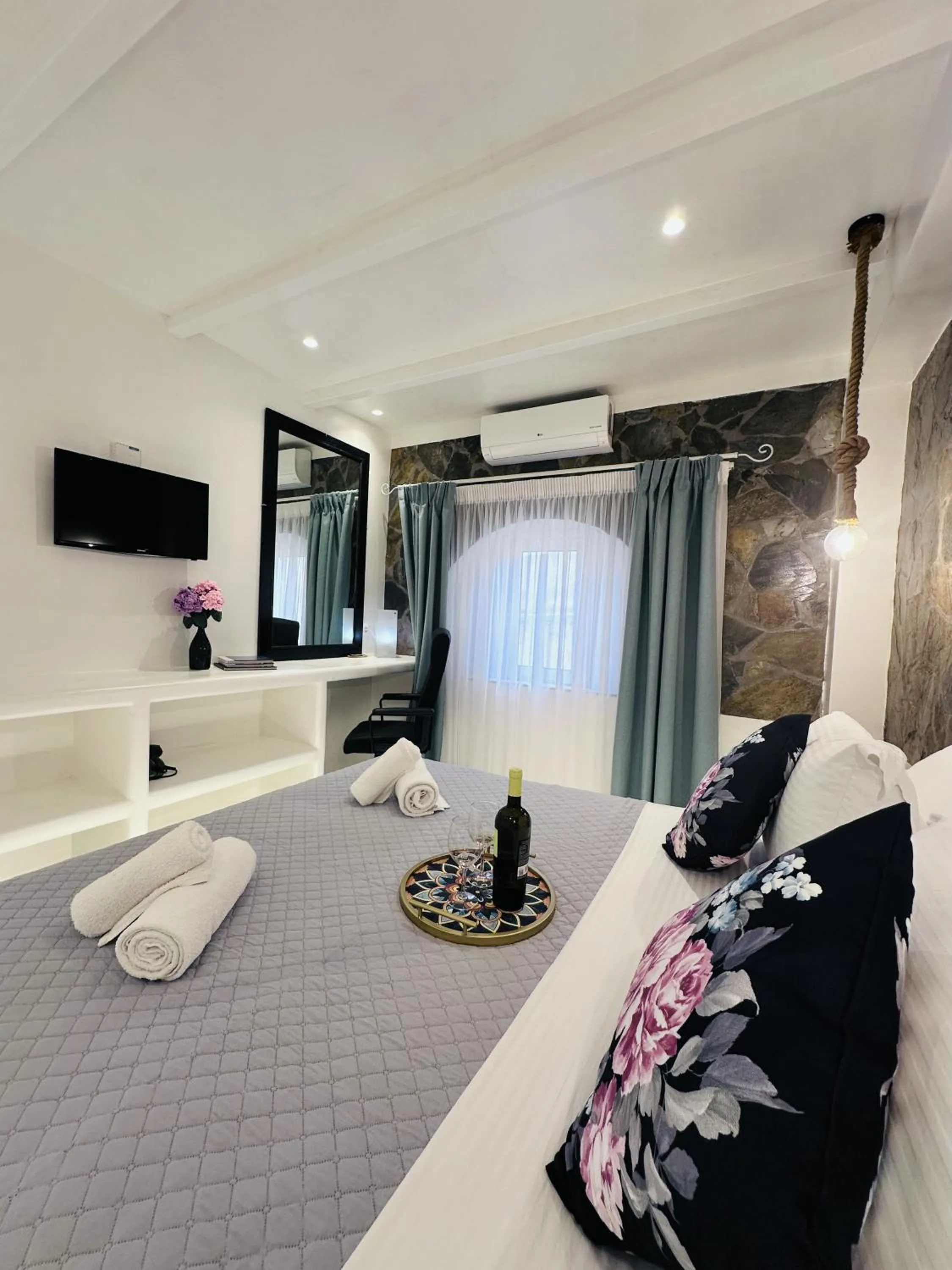 Bed in Arlene Suites