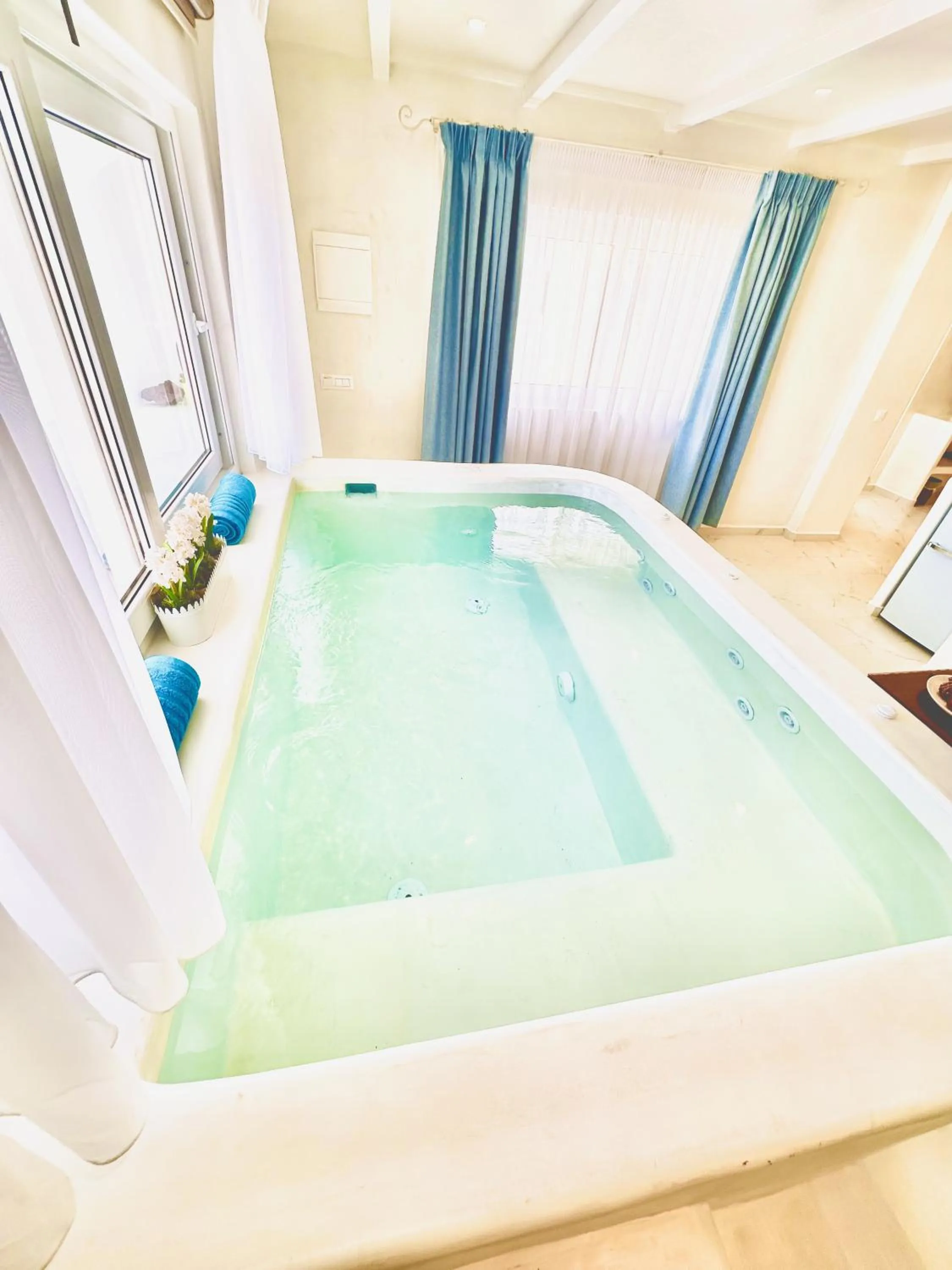 Bed in Arlene Suites