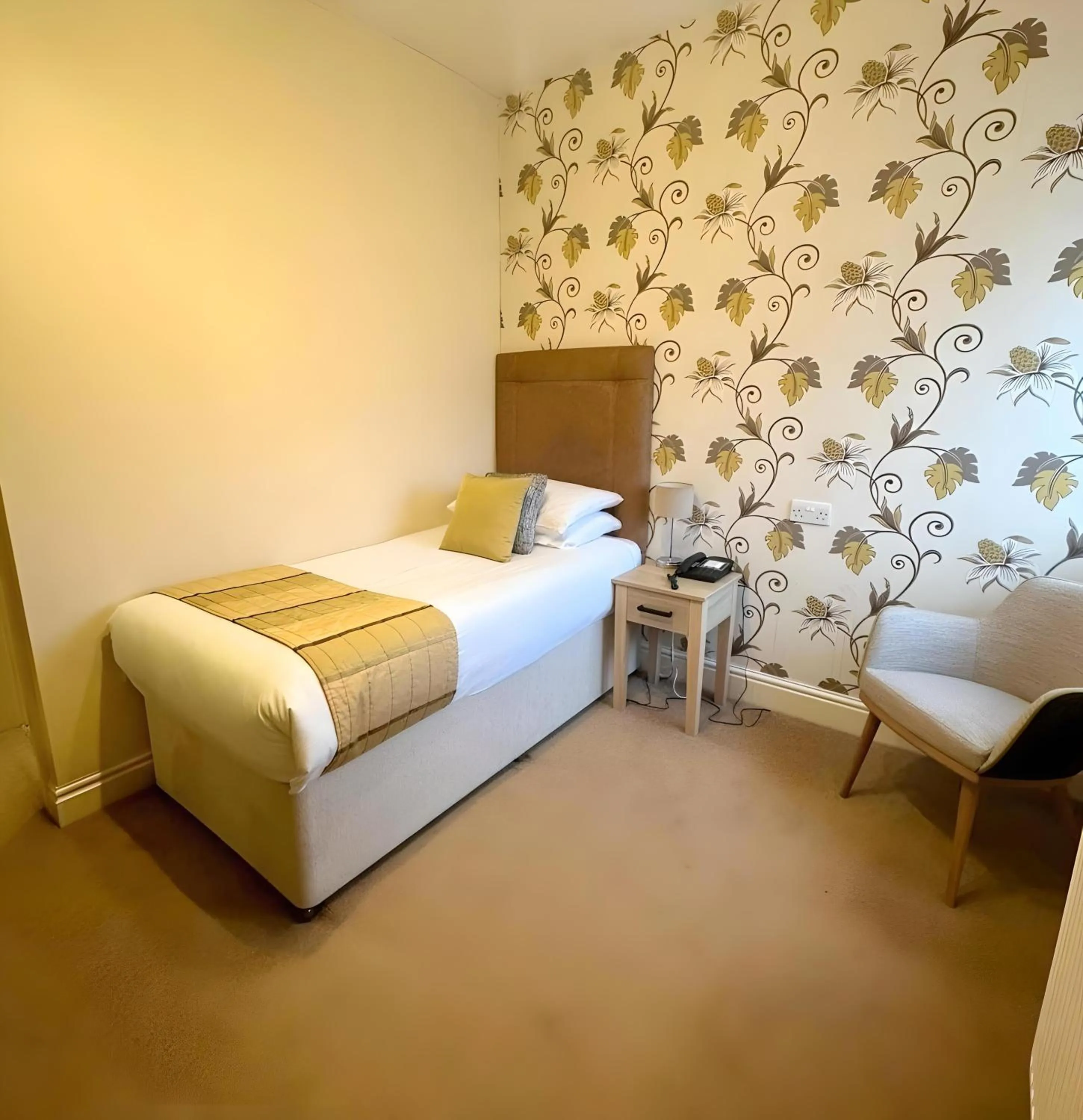 Bed in Caerwylan Hotel