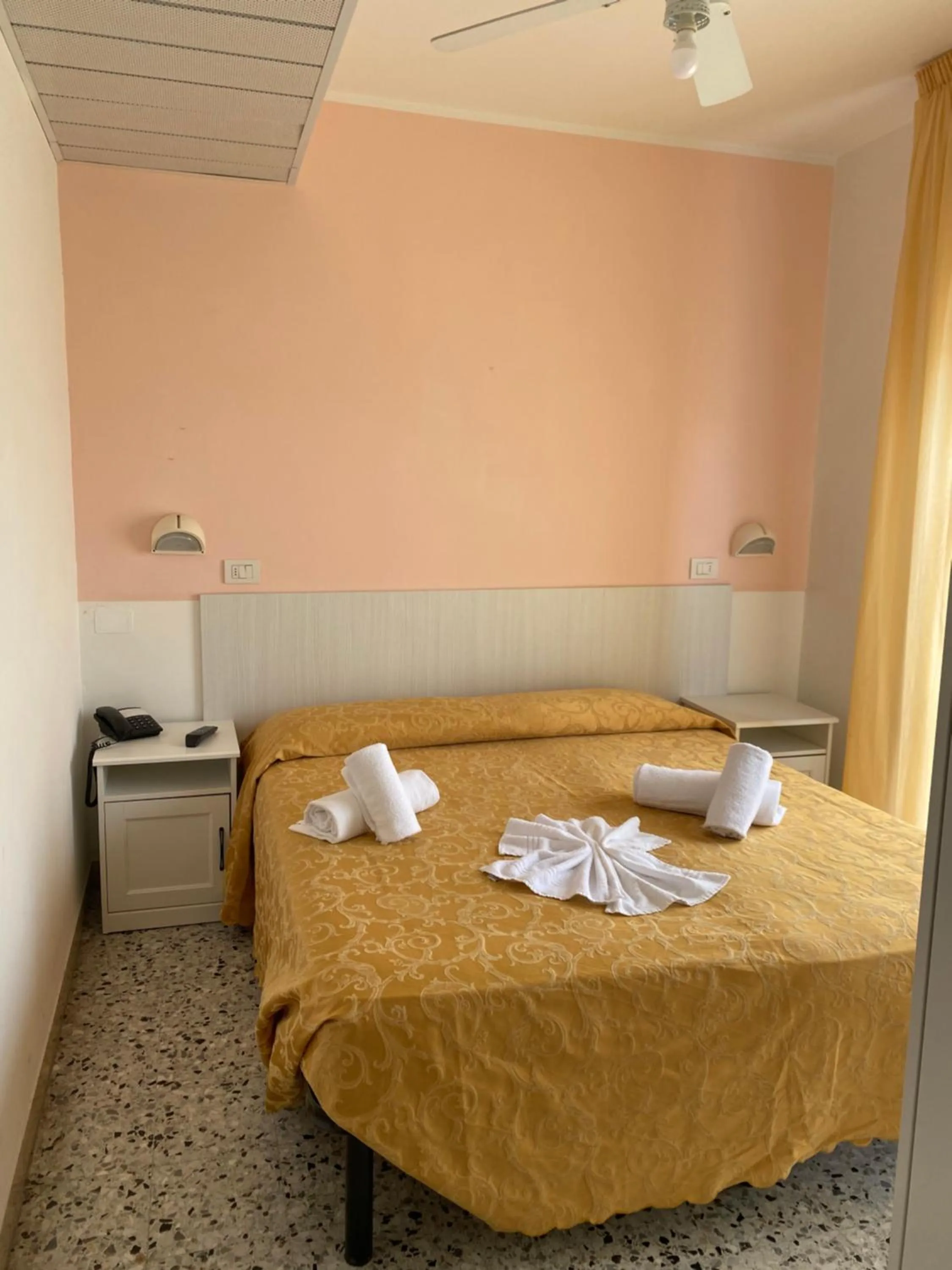 Bed in Hotel Modenese