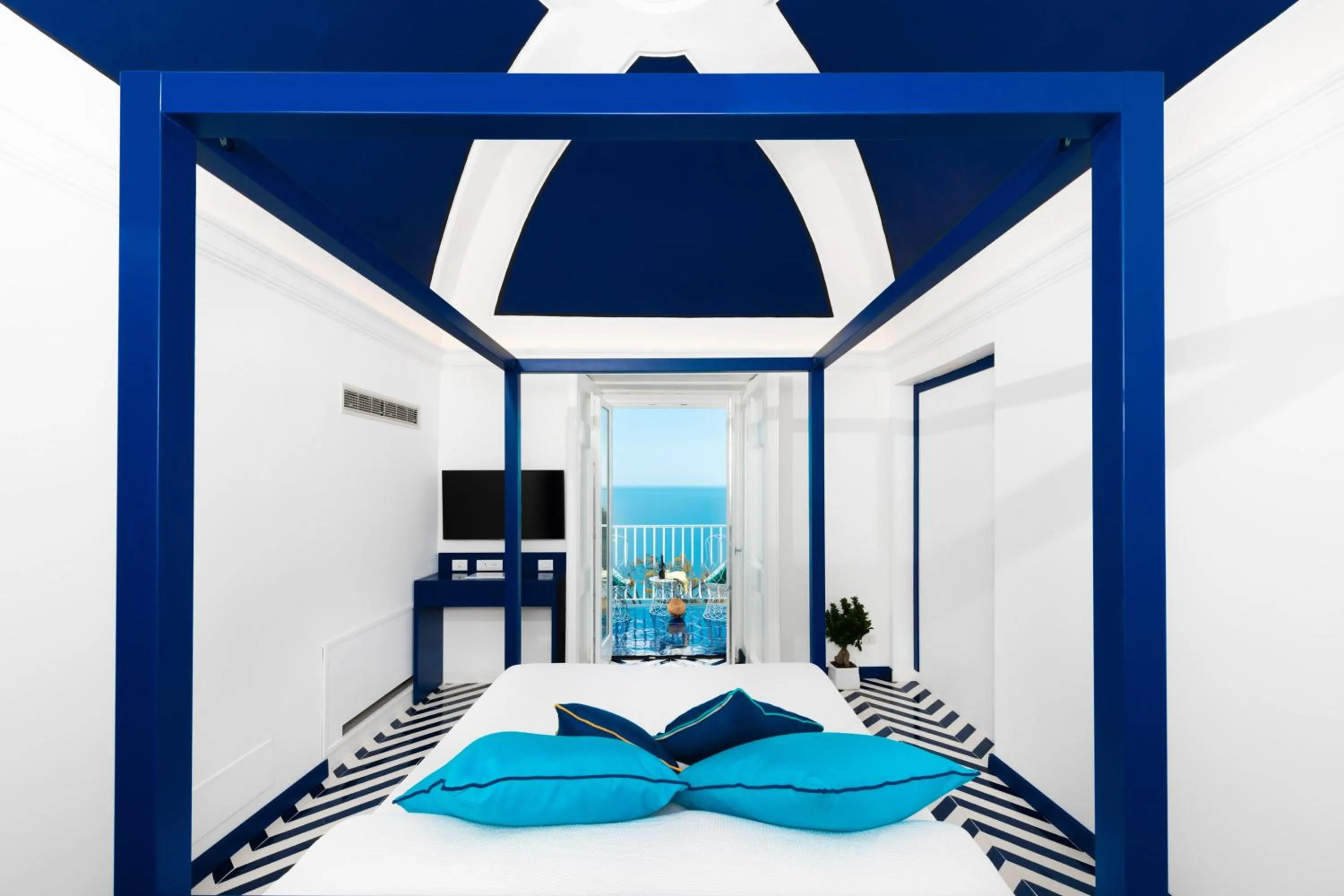 Bed in Imperati Suites by Alcione Residence
