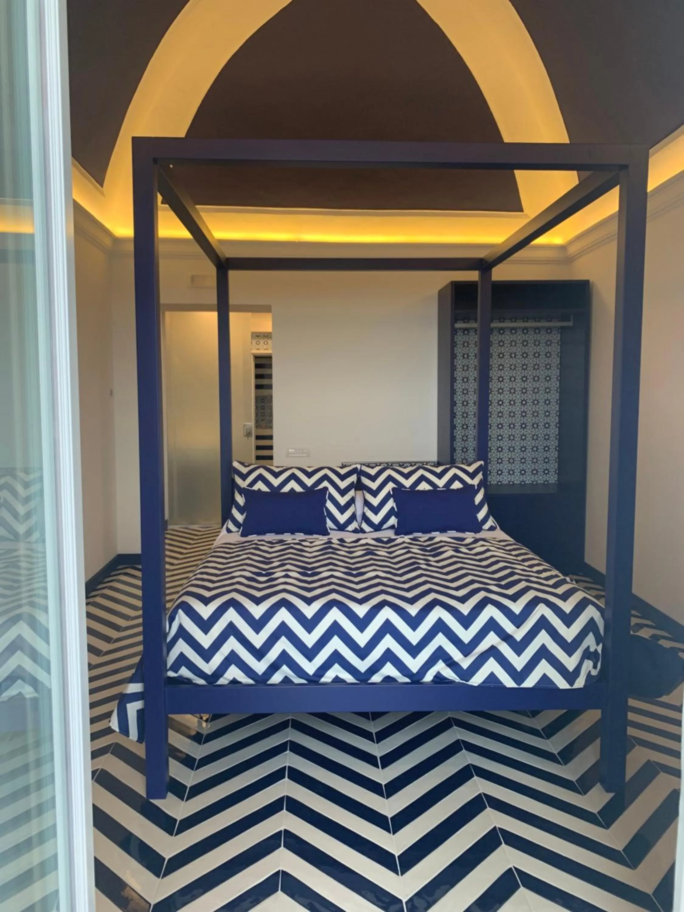 Bed in Imperati Suites by Alcione Residence