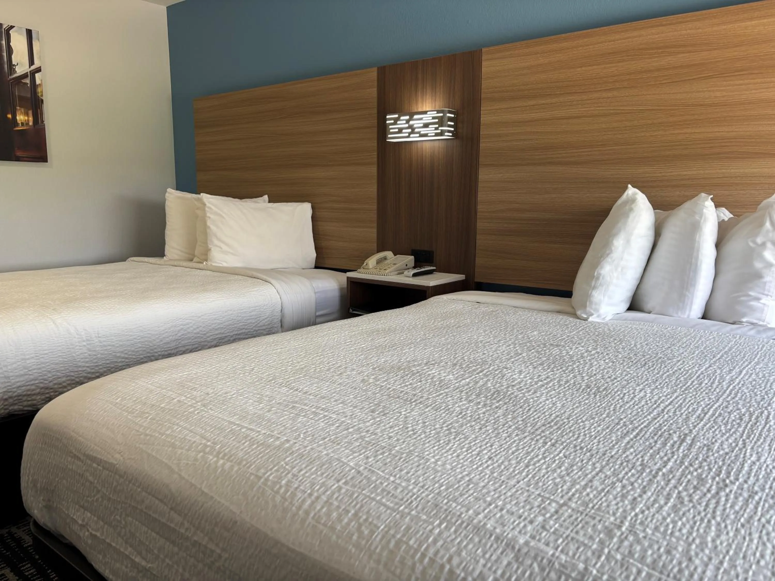 Bed in Baymont by Wyndham Jacksonville