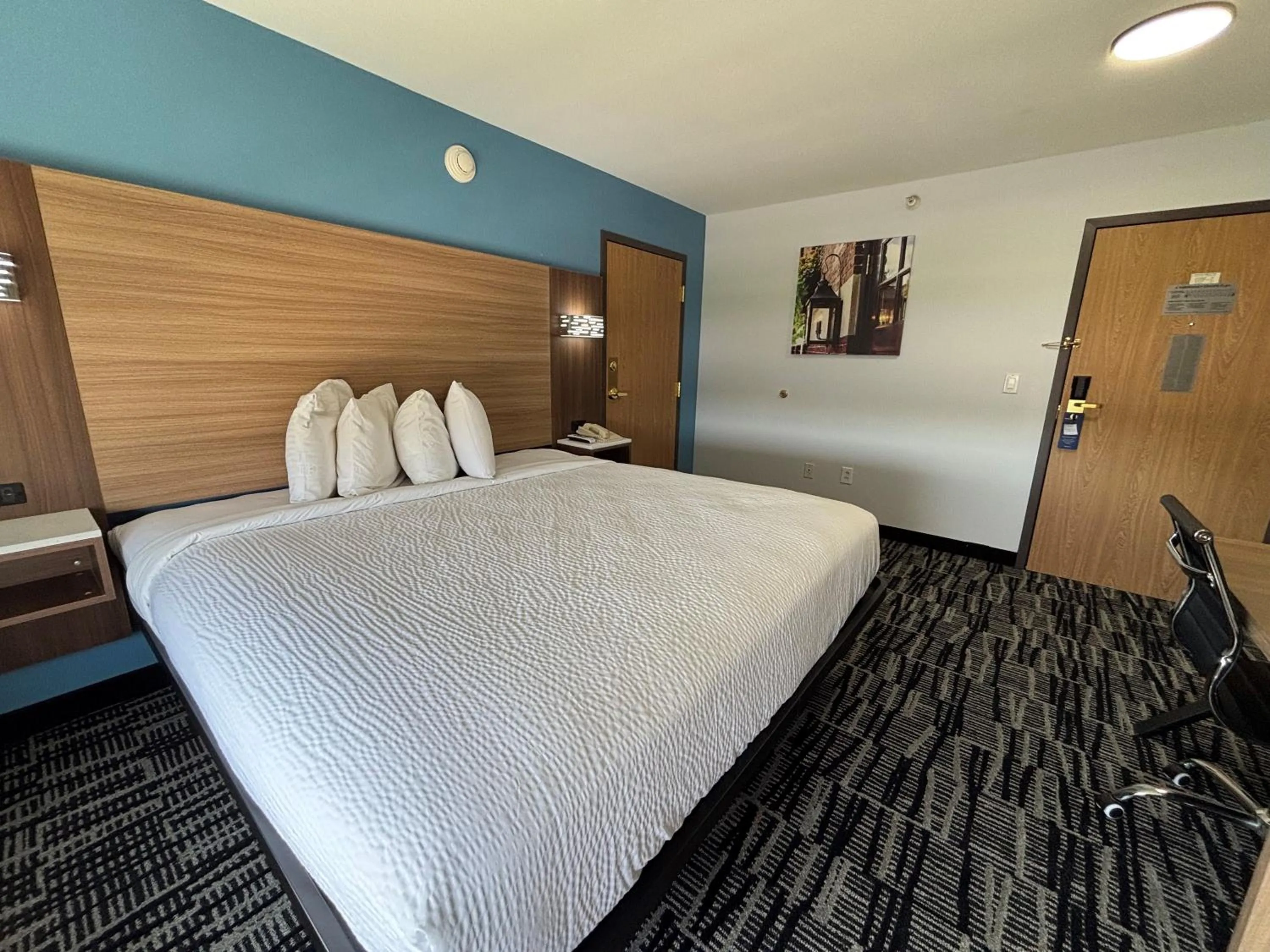 Bed in Baymont by Wyndham Jacksonville